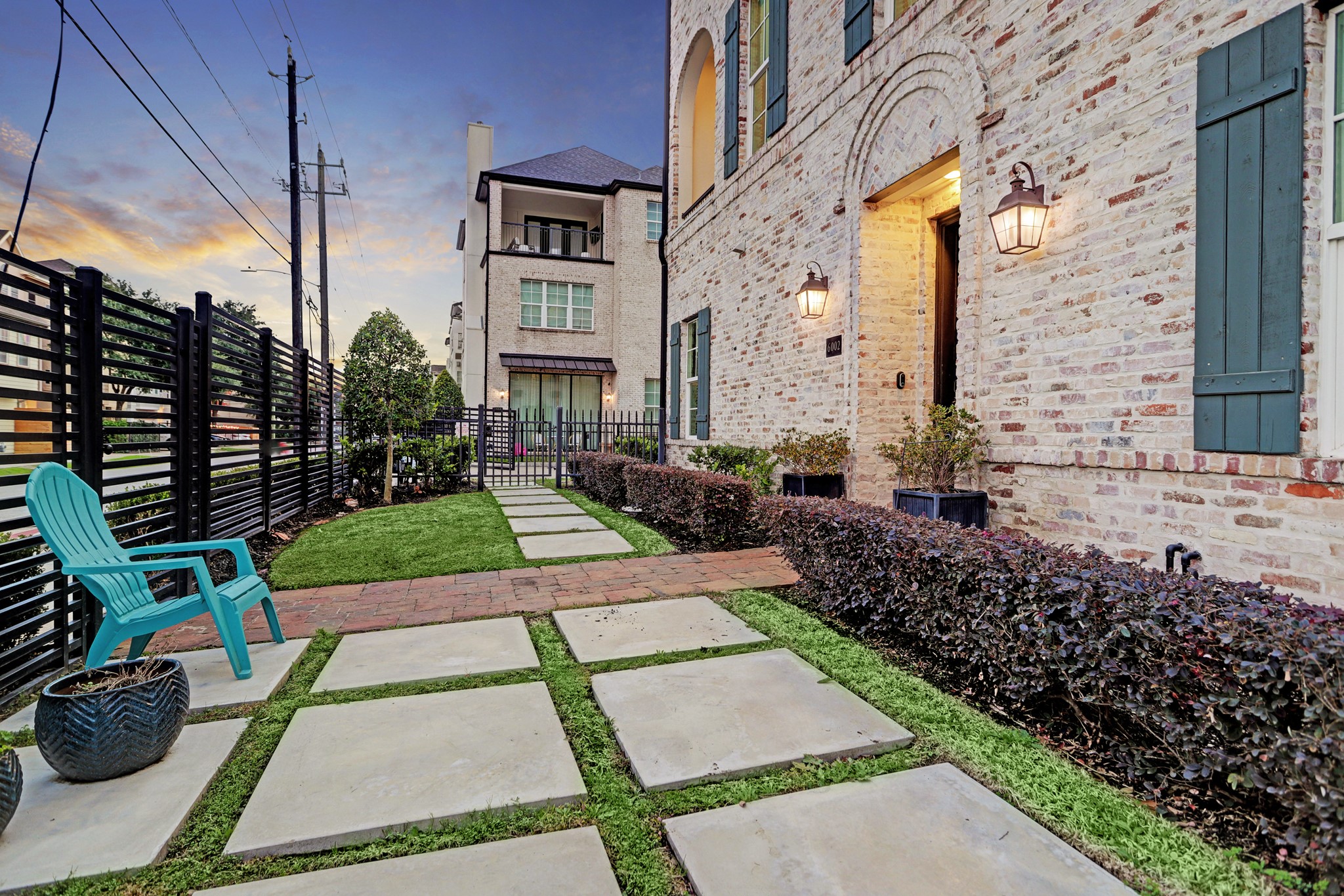 The yard is maintained by the HOA for an enjoyable low-maintenance private green space. The yard has secure, gated access to both the street (allowing for convenient guest parking and access), and inside the community.