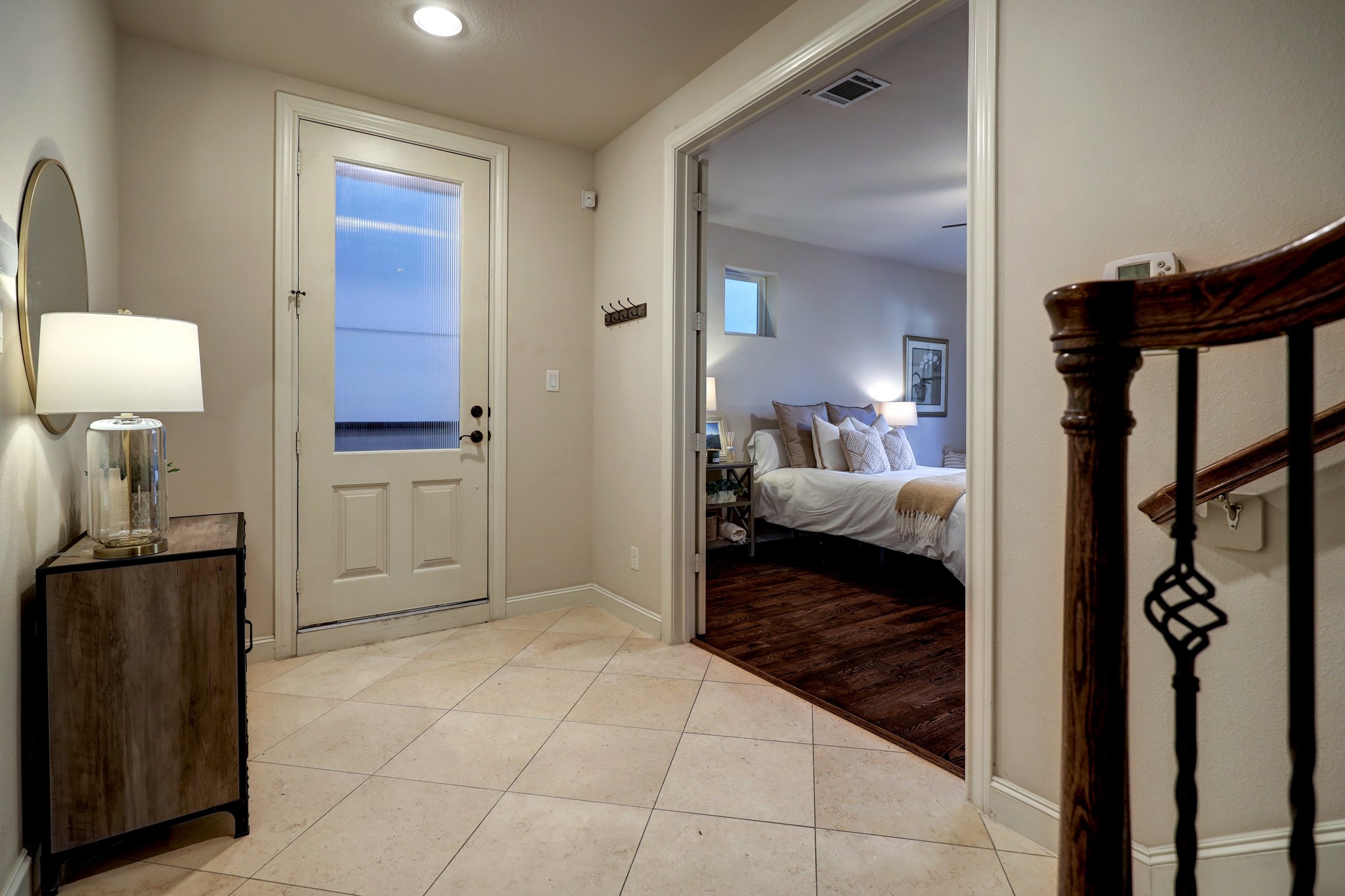 The front door opens to a formal entryway with double-doors.