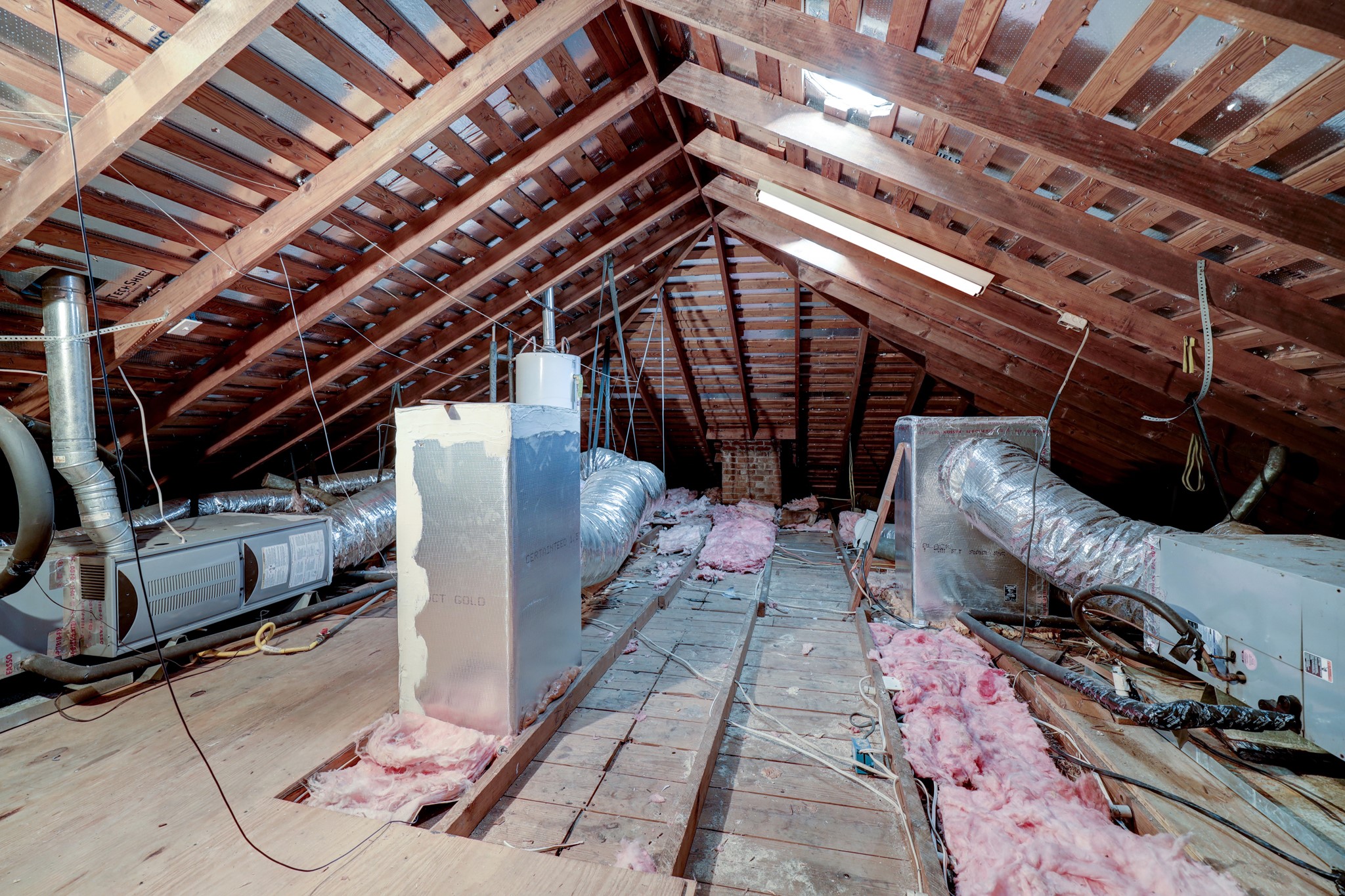 Duplex attic - Monarch roofing installed new roof Dec 2023.