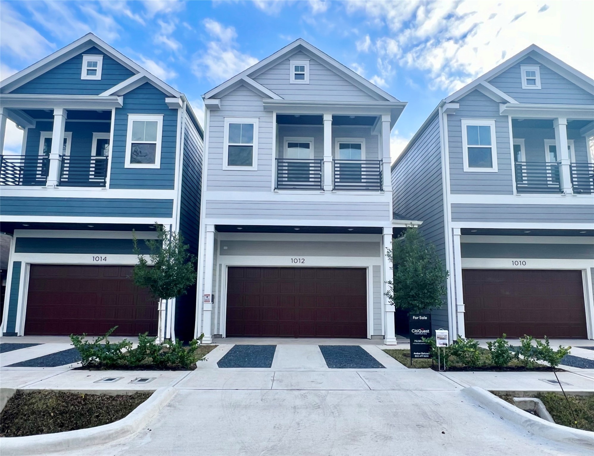 Notice the full-sized driveway, which offers ample space for vehicle parking and easy access to the home, while also contributing to the home's curb appeal with its well-integrated design.
