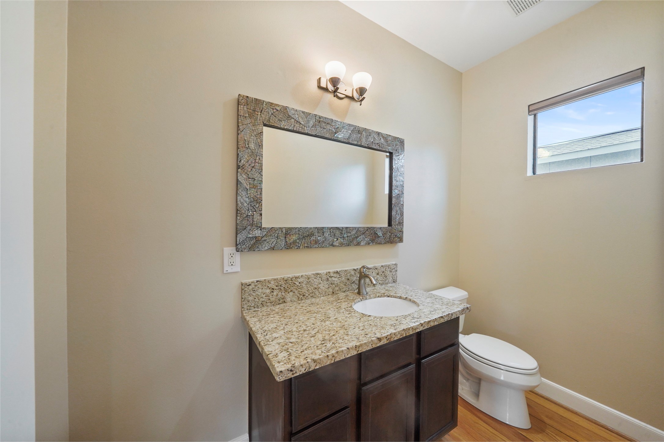 Half bath on the second level for the convenience of you and your guests.