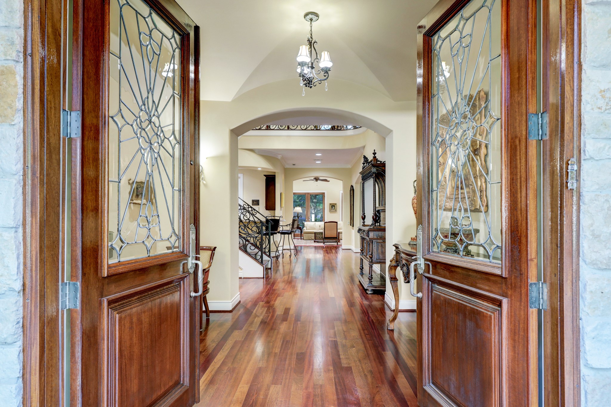 Upon entering through the double front doors, you step into the foyer which leads to the rest of the home.