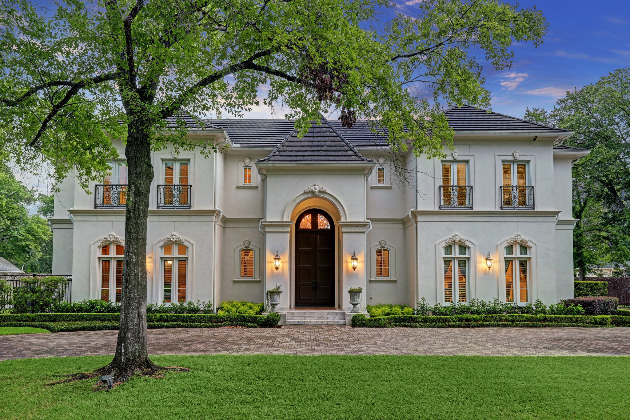 Truly extraordinary French-style home in Piney Point Village, custom built by King Residential. Featuring 6 beds, 6 full and 3 half baths, formals, chef's kitchen & additional catering kitchen, family room, home theater, game room and library, this home is perfect for both luxurious everyday living and high-end entertaining of all sizes