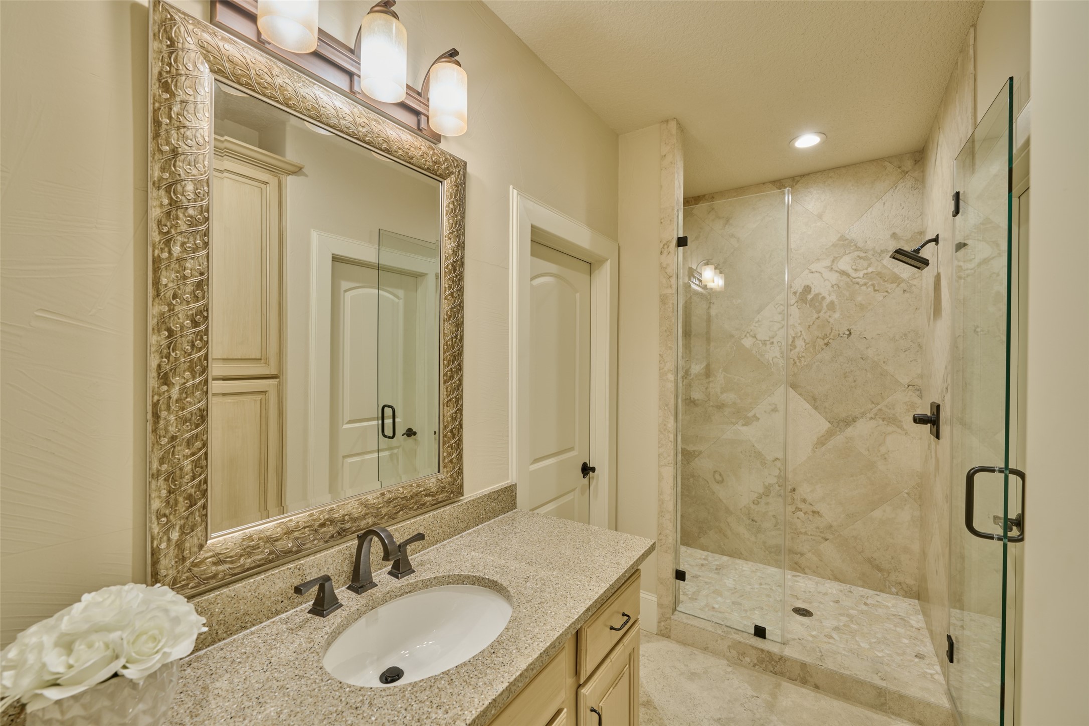Upstairs, all 3 bedrooms have full baths, bathroom walls are travertine marble, walk-in closets, and all share a full-size laundry room on the second floor.