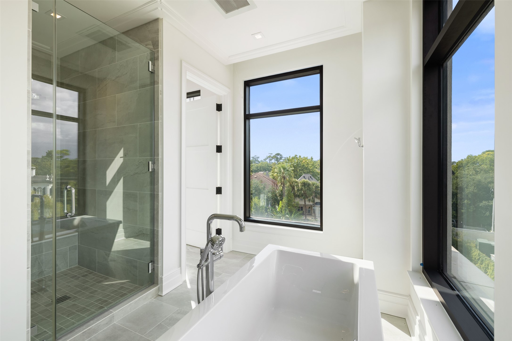 The Primary Bathroom also features a walk-in shower with bench.