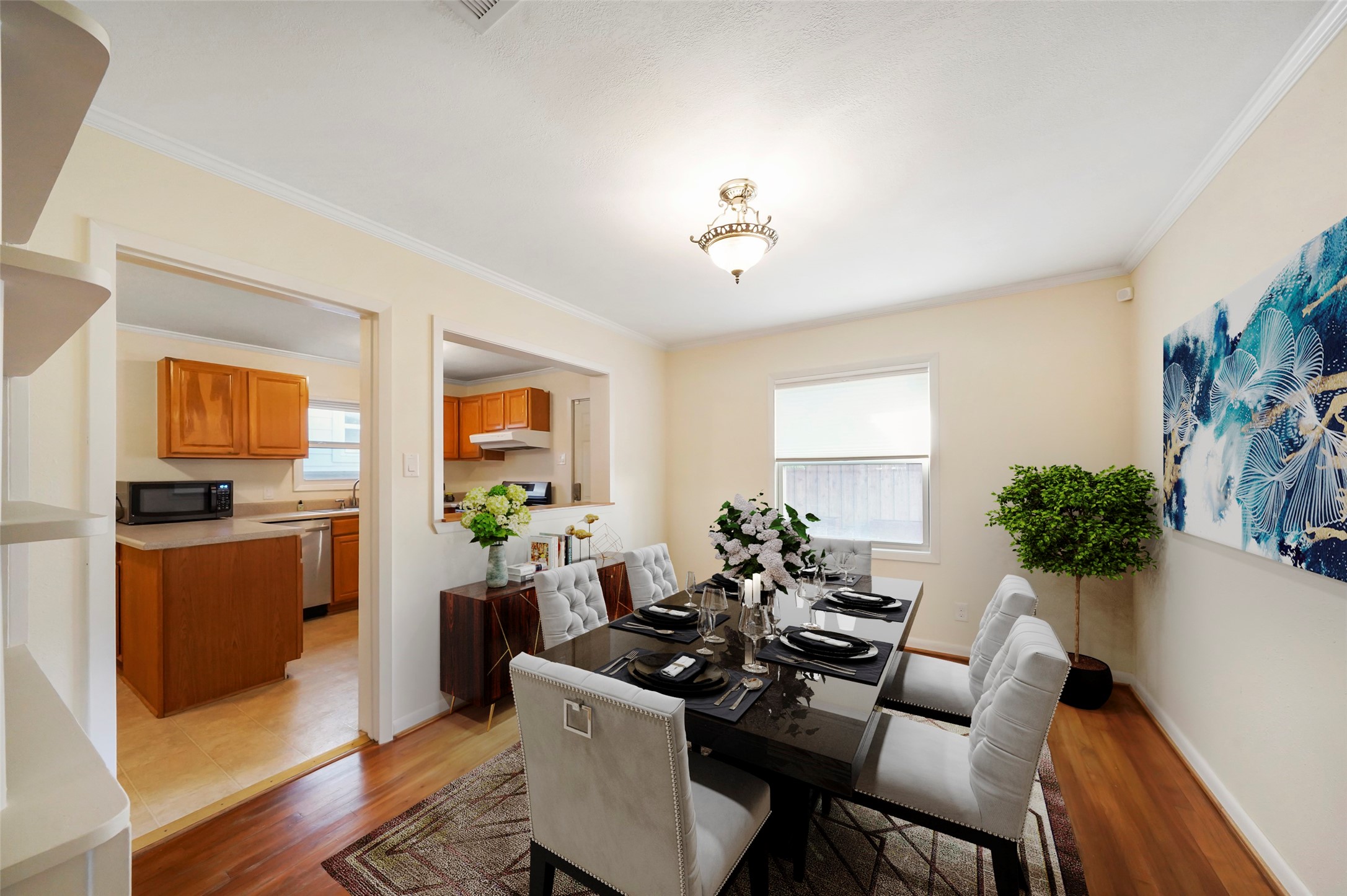 Formal dining space next to kitchen. Perfect for spending time with family or friends after work.