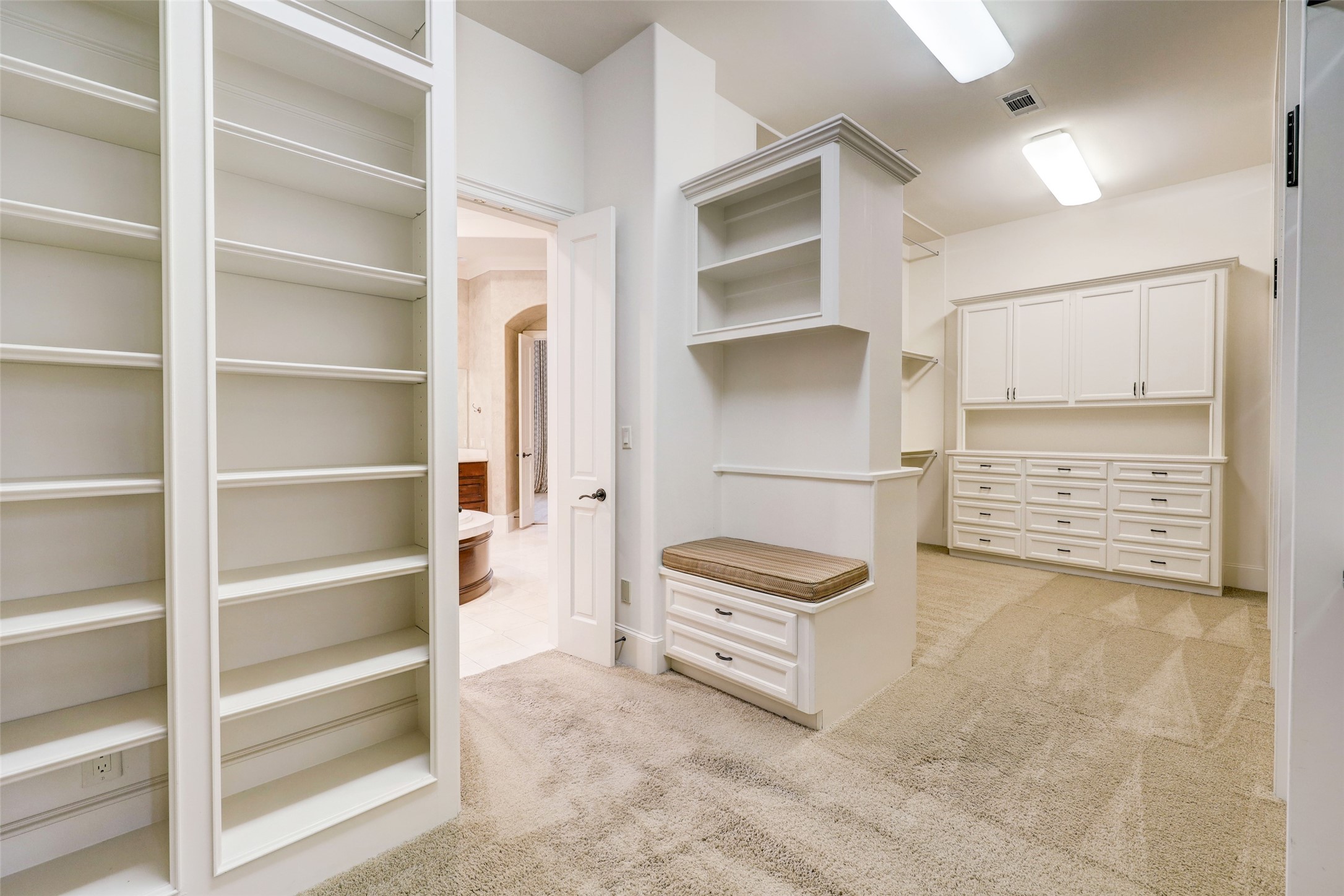 Now that you are worked out and clean, lose yourself in the massive Master Closet.