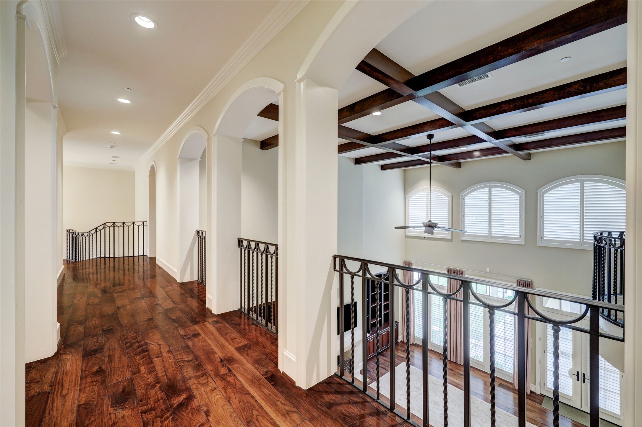 The upper Gallery features hardwood floors and a fantastic view of the Great Room below.