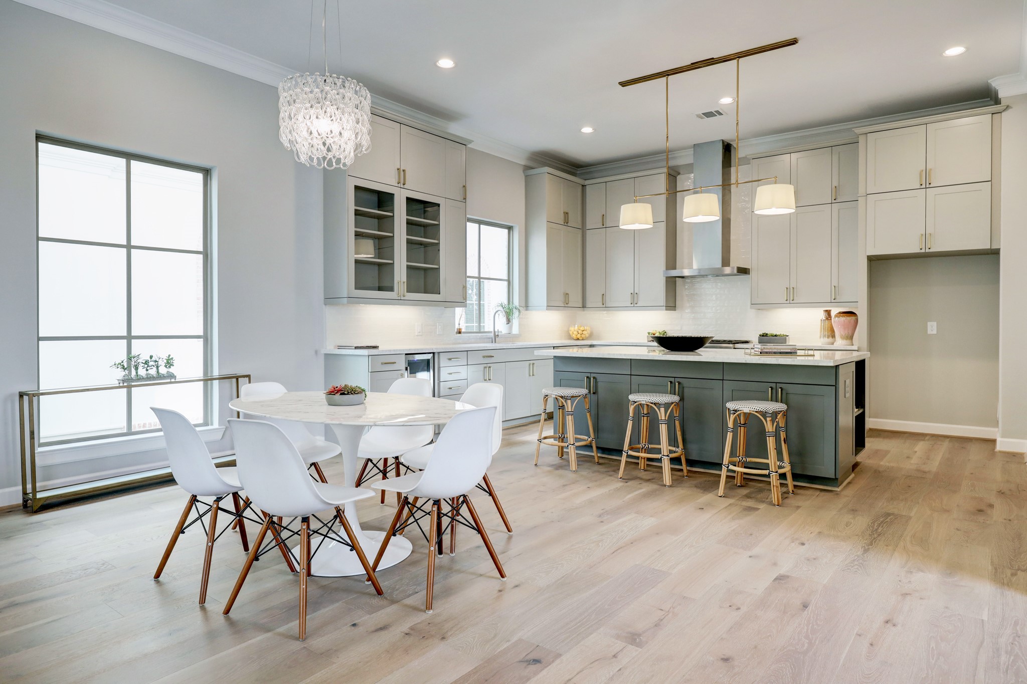 Bright and airy eat-in kitchen opens to the living and dining areas.