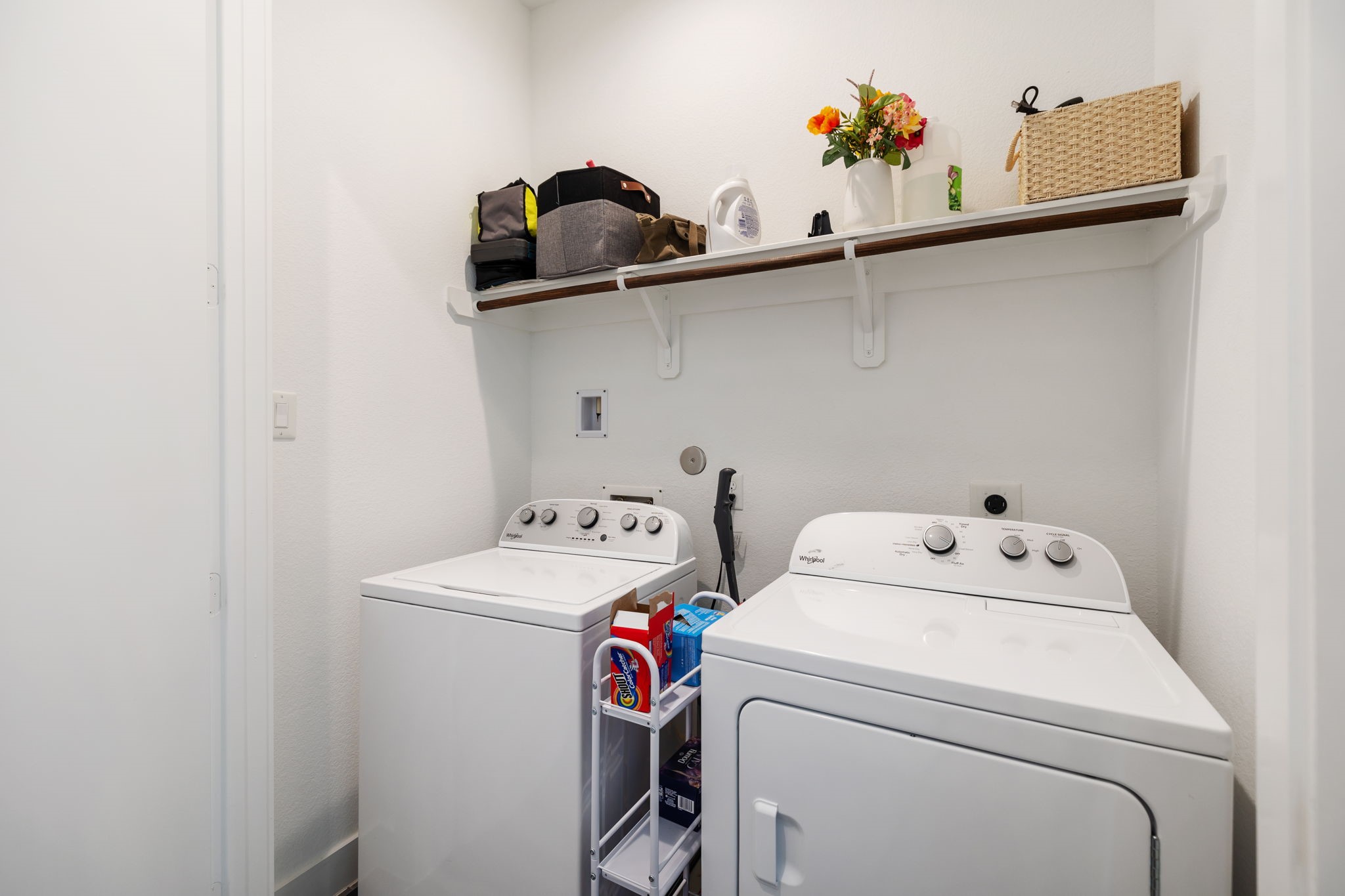 Utility room is intelligently situated on the third floor between the two bedrooms for easy acess.