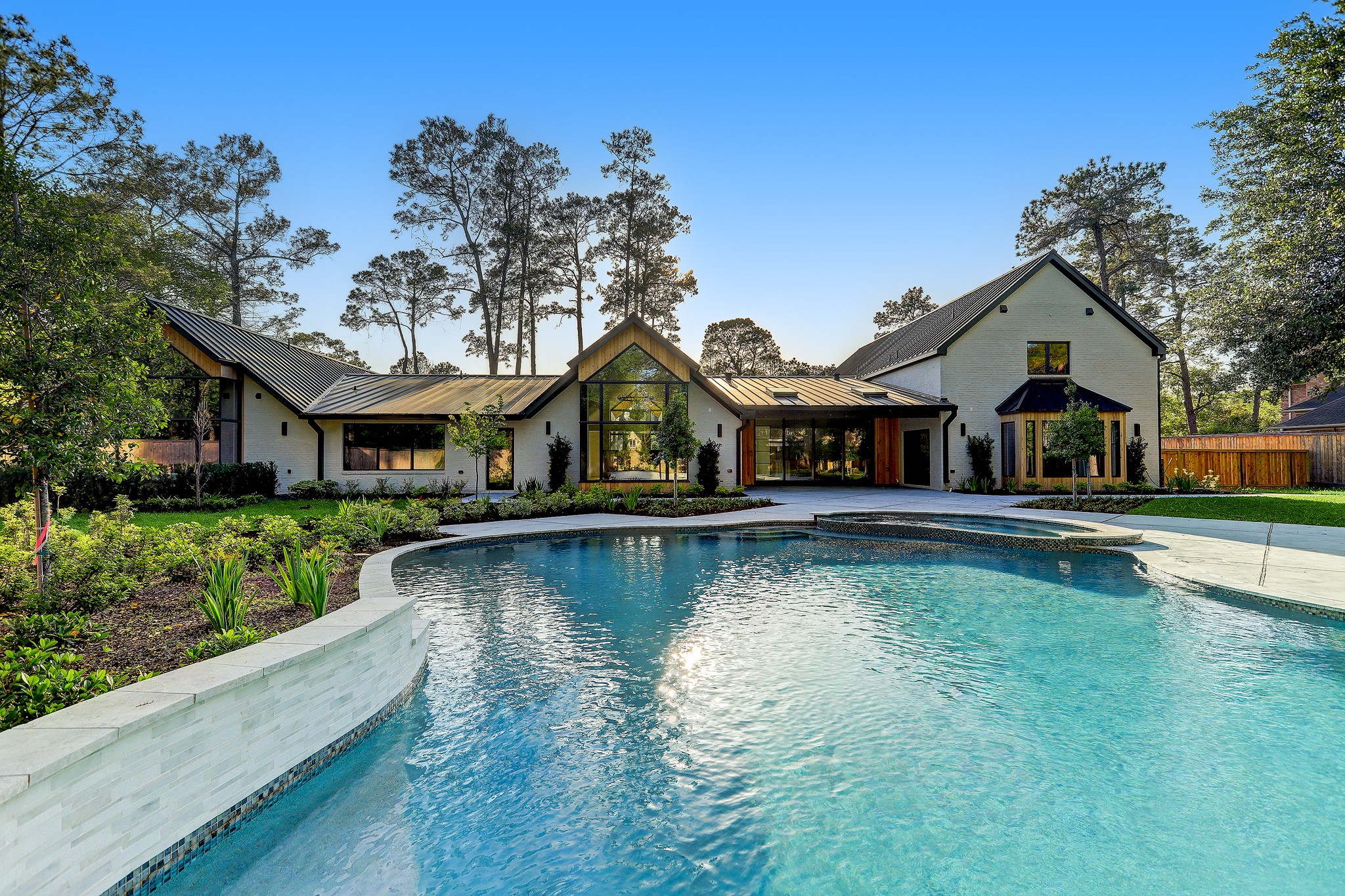 Expertly reconstructed 8,023 sq ft Piney Point showcase home on a 46,187 sq ft lot and built with uncompromising quality rivaling the finest new construction