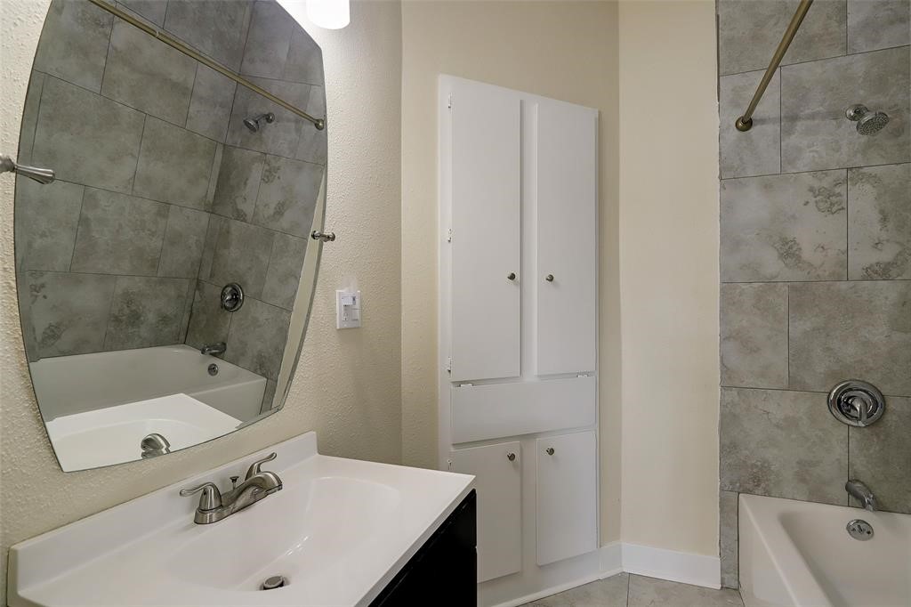 This updated bathroom is connected to one of the upstairs bedrooms