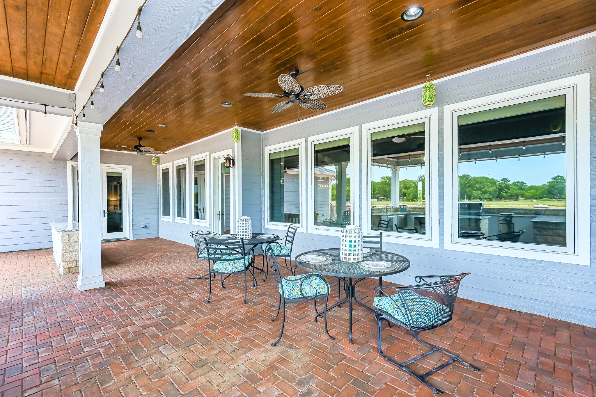 Enjoy listening to music piped in from your five outdoor speakers on this Huge Veranda with  space for tables and an outdoor living space.