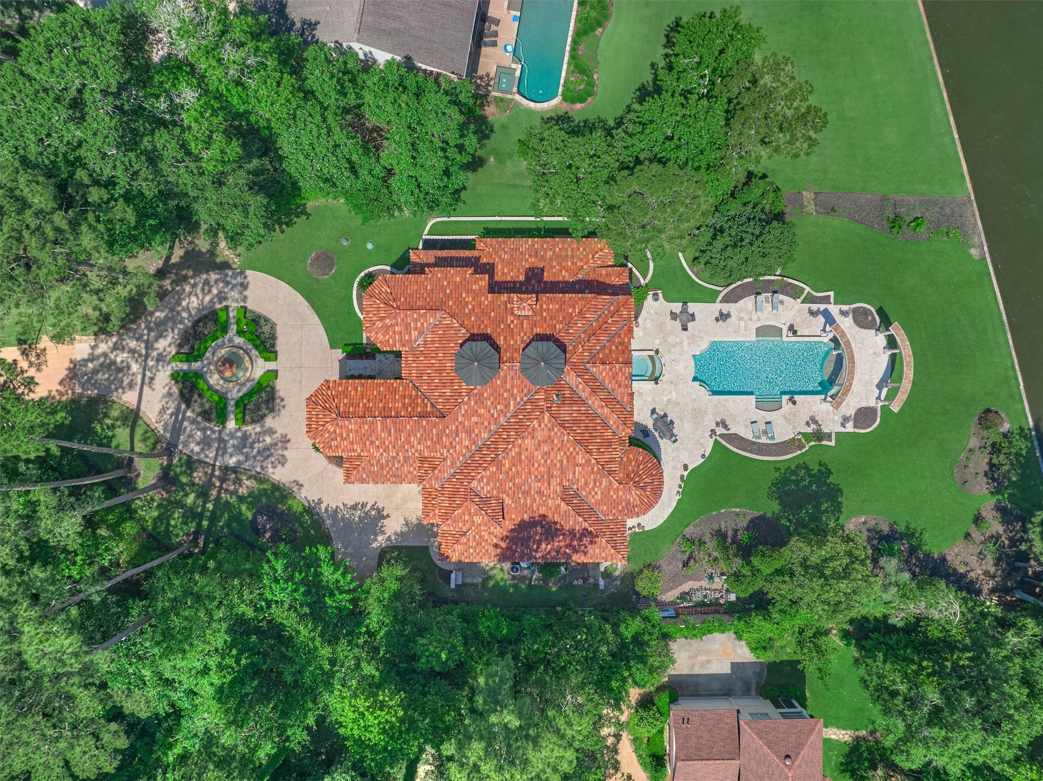 Aerial View gorgeous tile roof and 2 Copper Cupolas