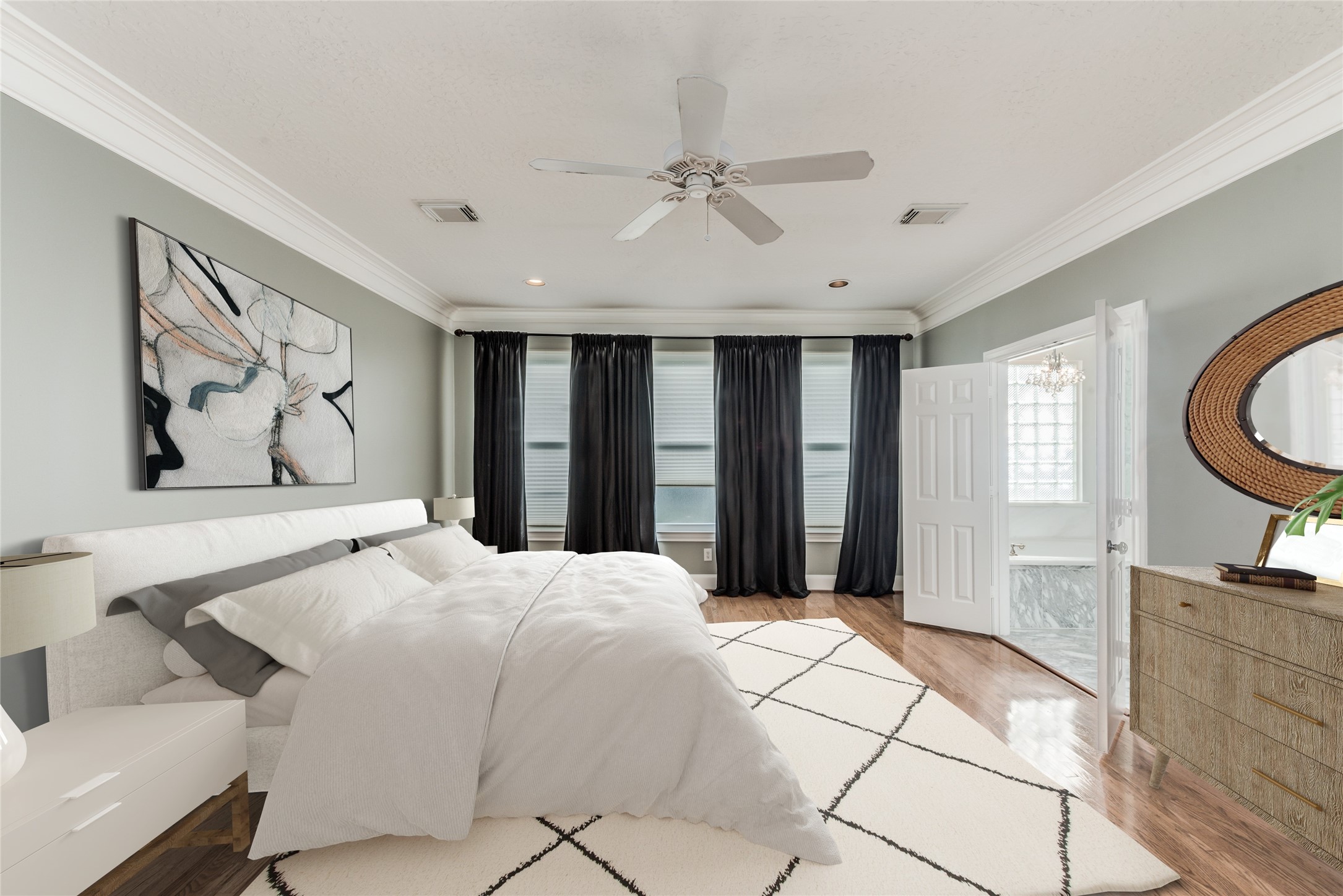 Updated 3 bedroom, 3.5 bath custom townhome built by Doyle Stuckey Homes in gated Park at Post Oak. Home has hardwood flooring, 10 and 11 foot ceilings and crown moulding throughout.