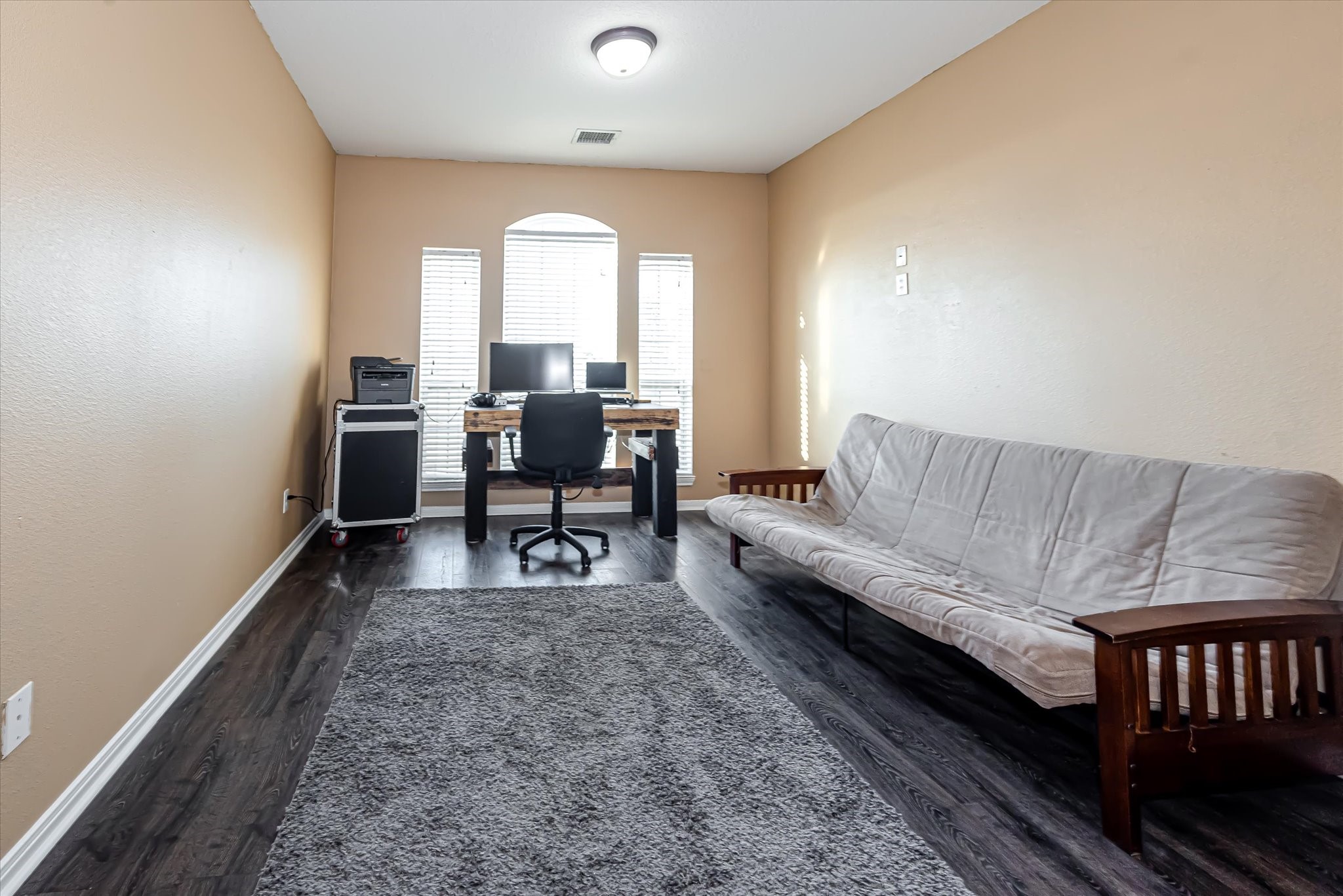 Bedroom 2 - wood-look laminate flooring installed Oct 2022.