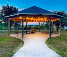Gazebo has lighting for quiet evenings or large gatherings in the back.