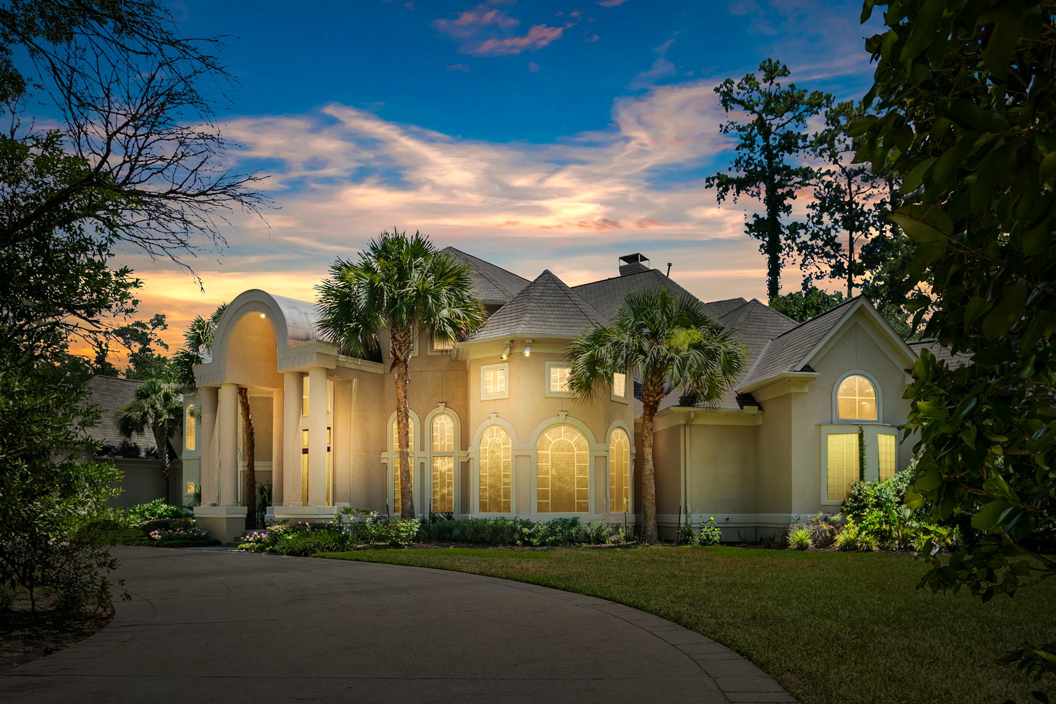 This gorgeous Piney Point showcase home has it all, embraced by tasteful
landscaping, plus lovely palm and specimen trees, with circular drive and porte-cochère, offering ample
parking when hosting events.