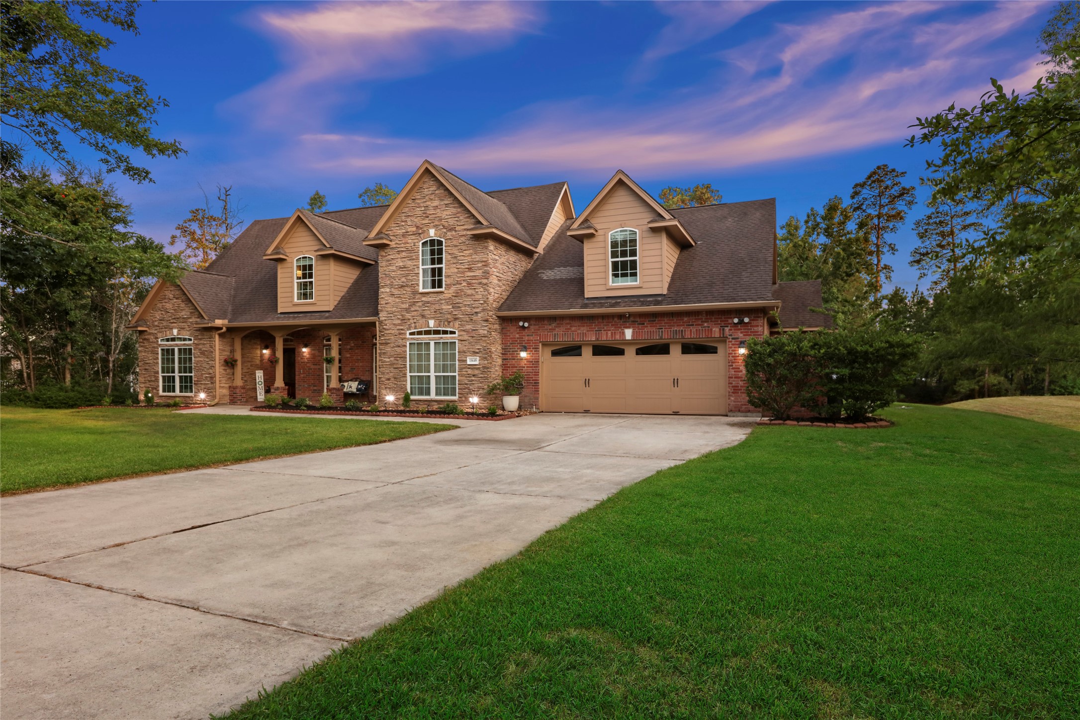 Gorgeous custom home on nearly 3 acres in gated community, MISD, low tax rate, close to Lake Conroe.