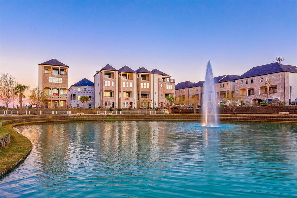 gorgeous community lake at center of the cozy gated community