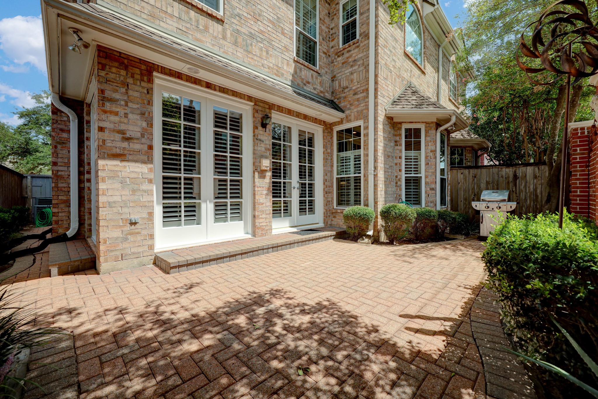 The back patio can be accessed through the French Doors located in the family room.
