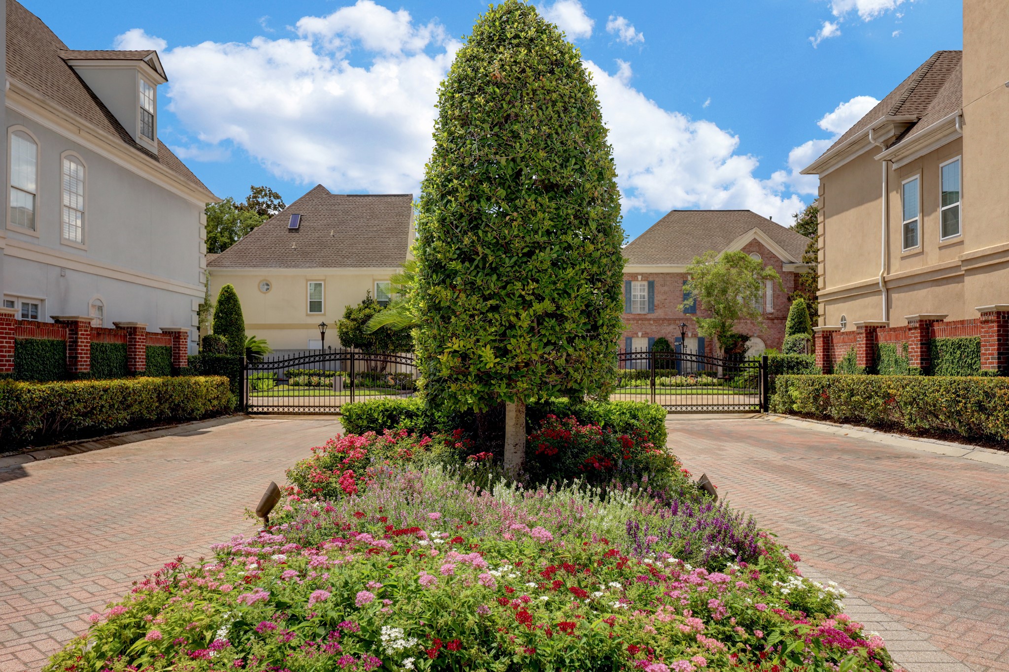 The community is well-maintained and gated for added security.  The entrance is beautifully landscaped with an abundance  of colorful plantings.