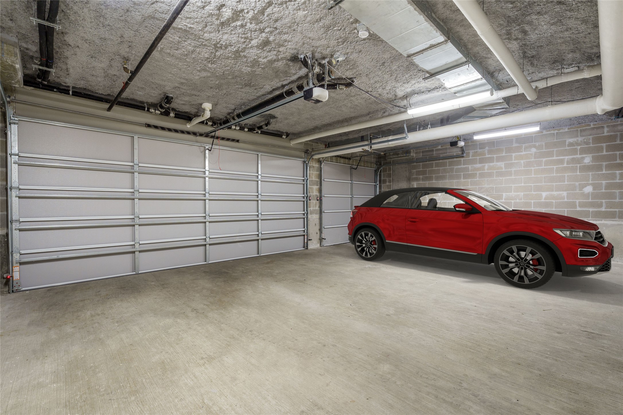 Private 3 Car Garage with 2 climate controlled storages.
