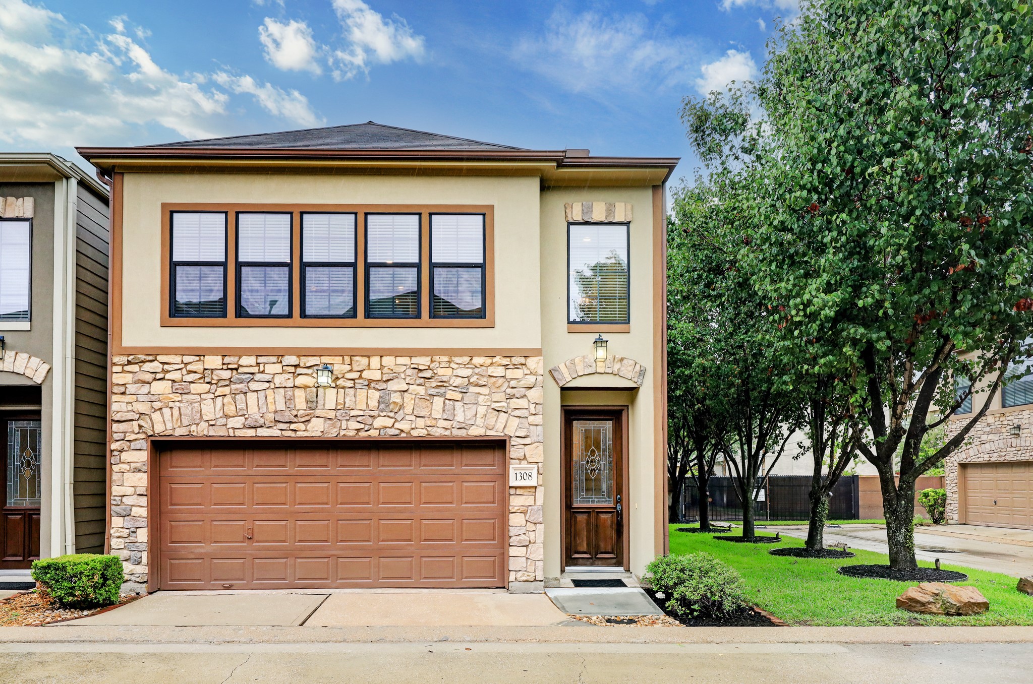 Welcome to 1308 Studer: a welcoming 2 bed/2 bath home located in a highly desirable Rice Military gated community!