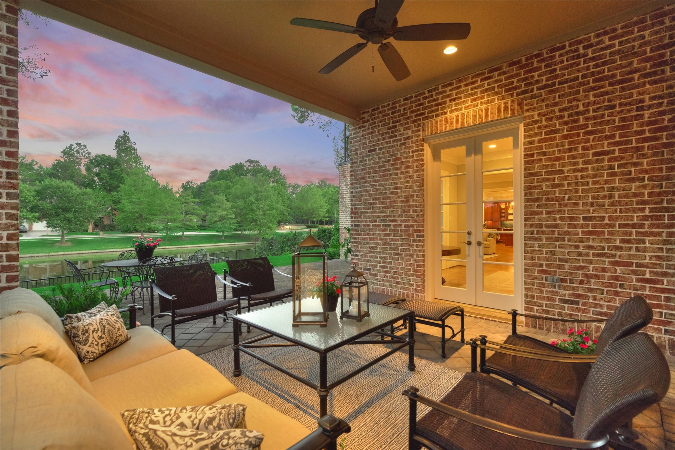 Relax and enjoy the view as you gather family & friends on the covered back patio that overlooks the lake.