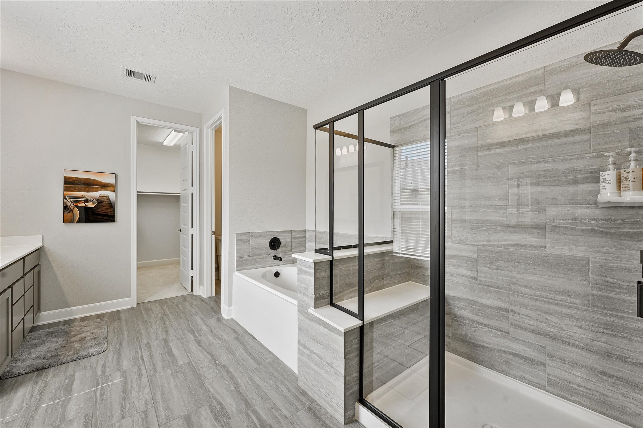 Separate shower and soak tub.