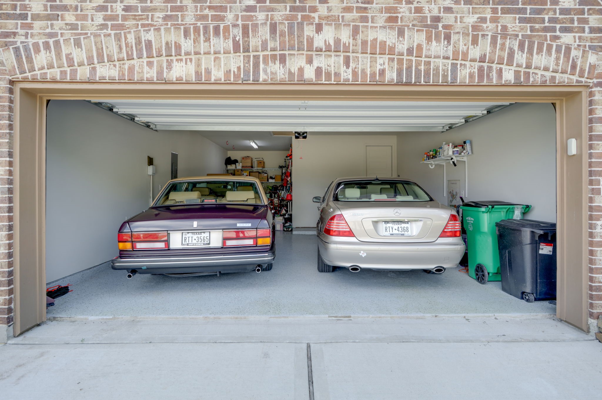 Garage fits three cars (left, in-line).