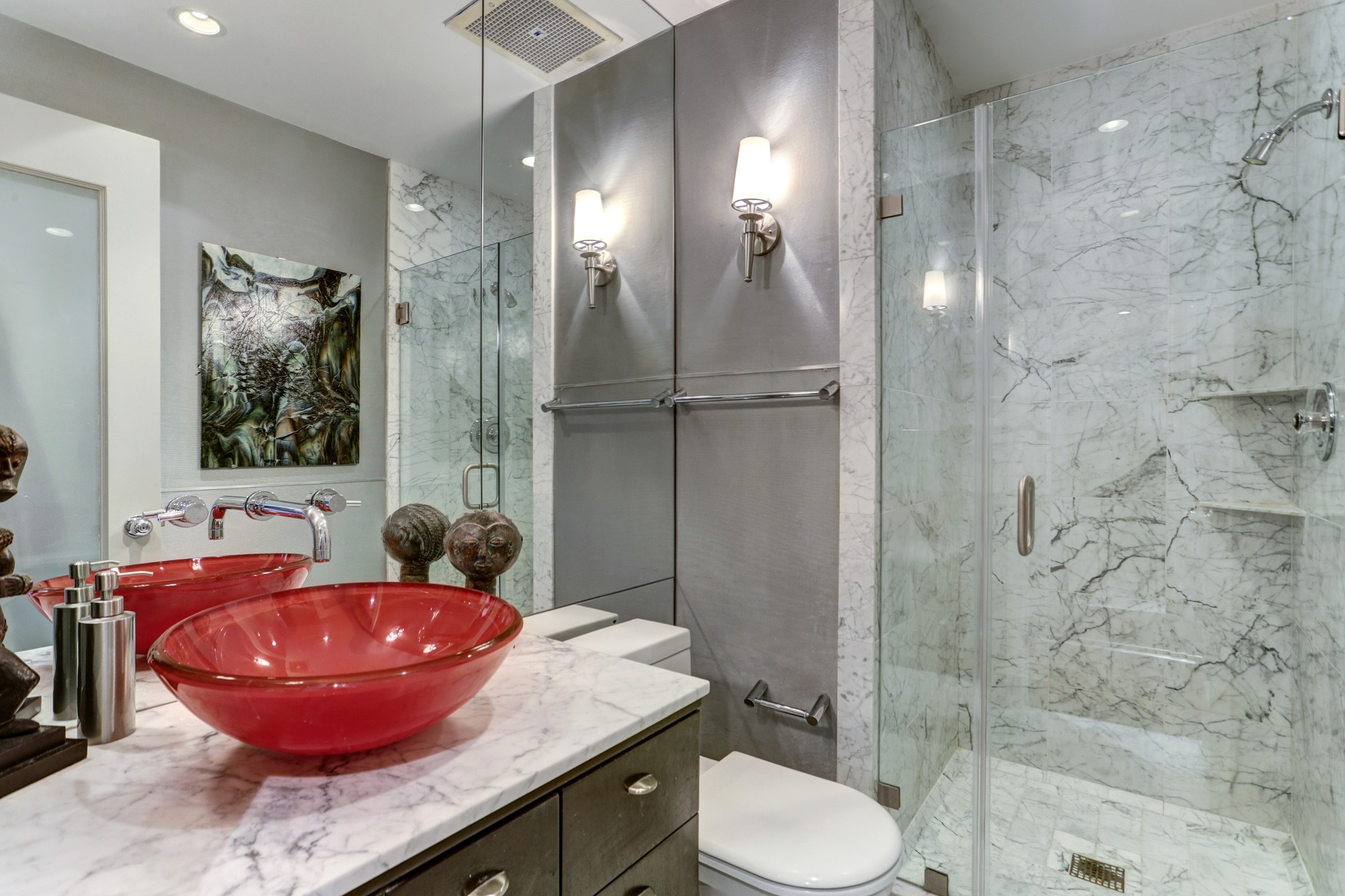 Statuary Venetino marble is featured in the guest bath with marble counter tops.