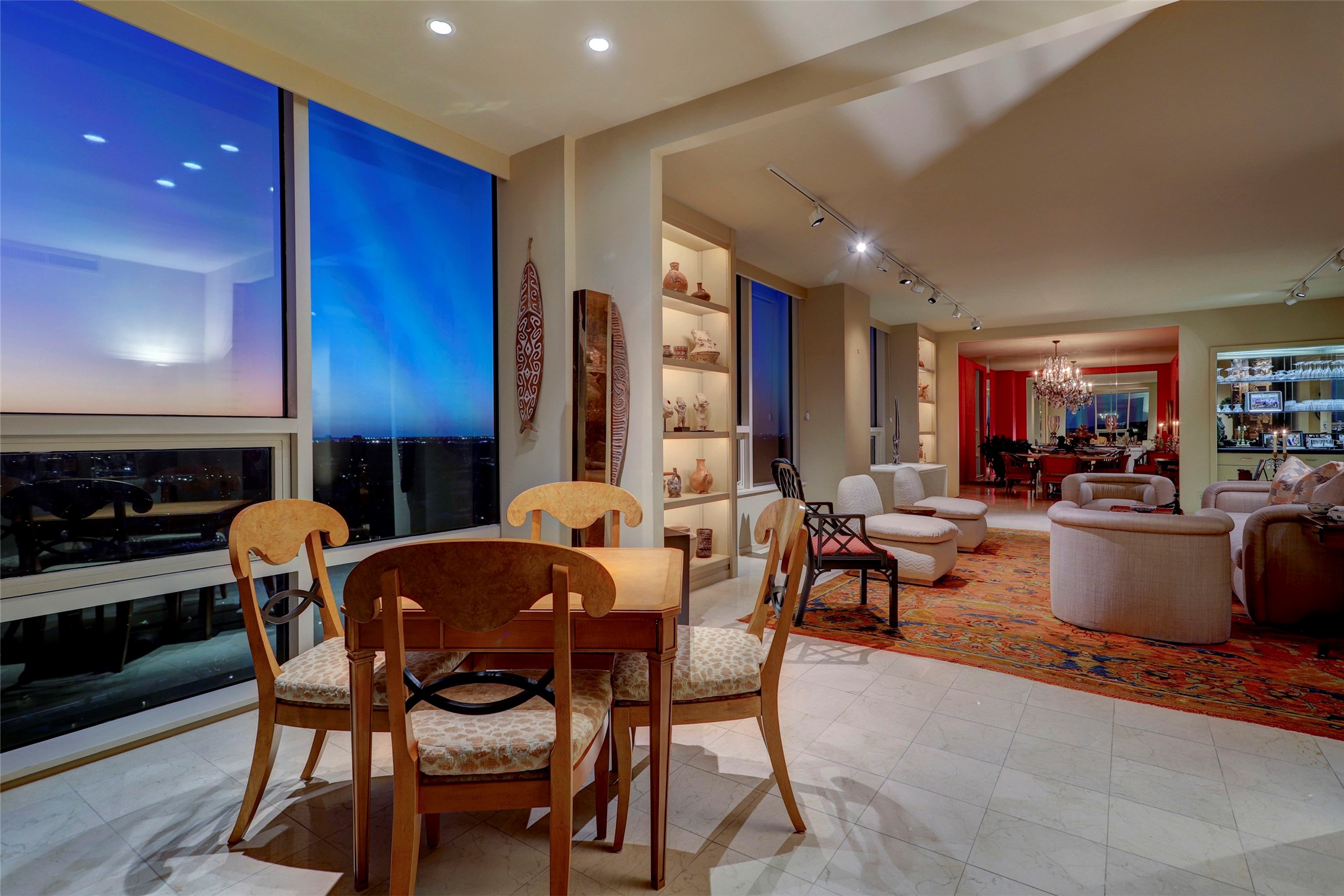 This vantage captures the full length of the condo from the den to the dining area.