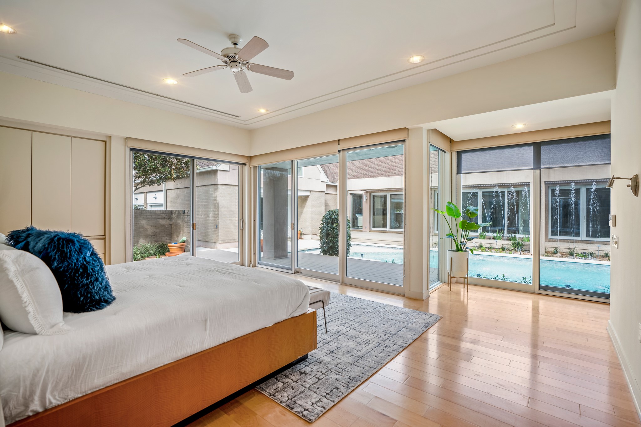 Welcome into your primary bedroom, with sliding glass doors inviting you outside to your oasis.
