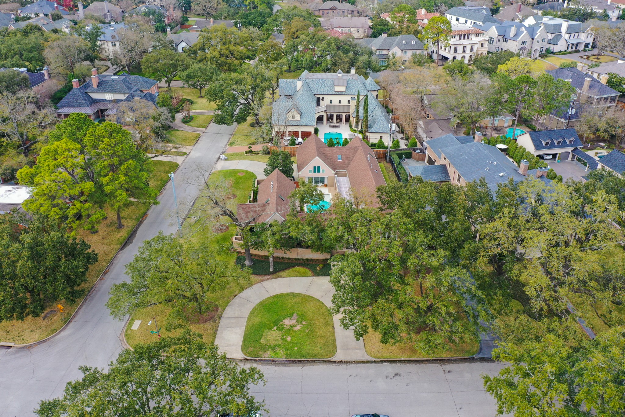 Aerial view of 5588 Doliver on the corner of Sherbrooke Road and Doliver Drive.