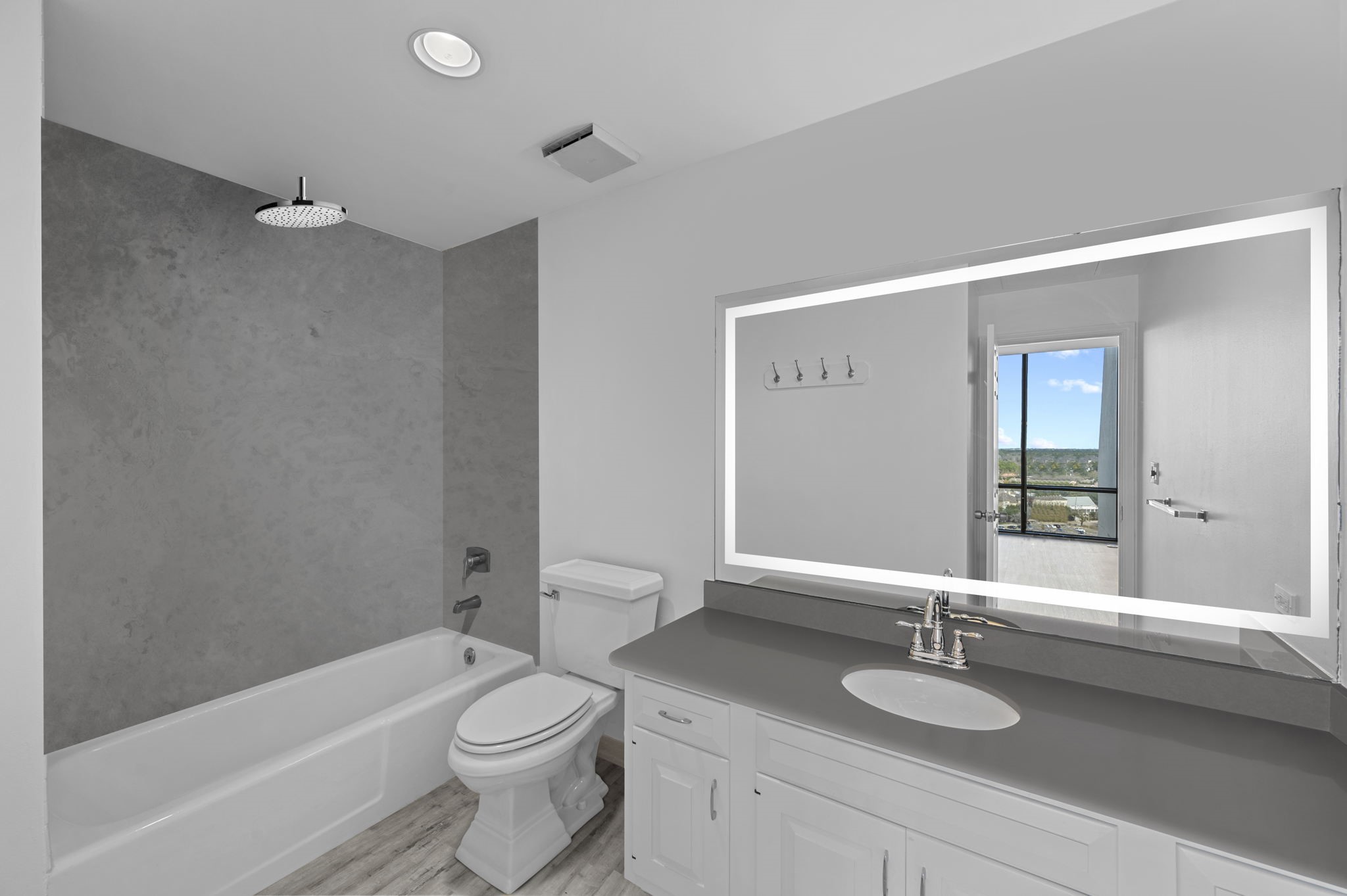 Virtual rendering of alternate finishes to the upstairs secondary bathroom.