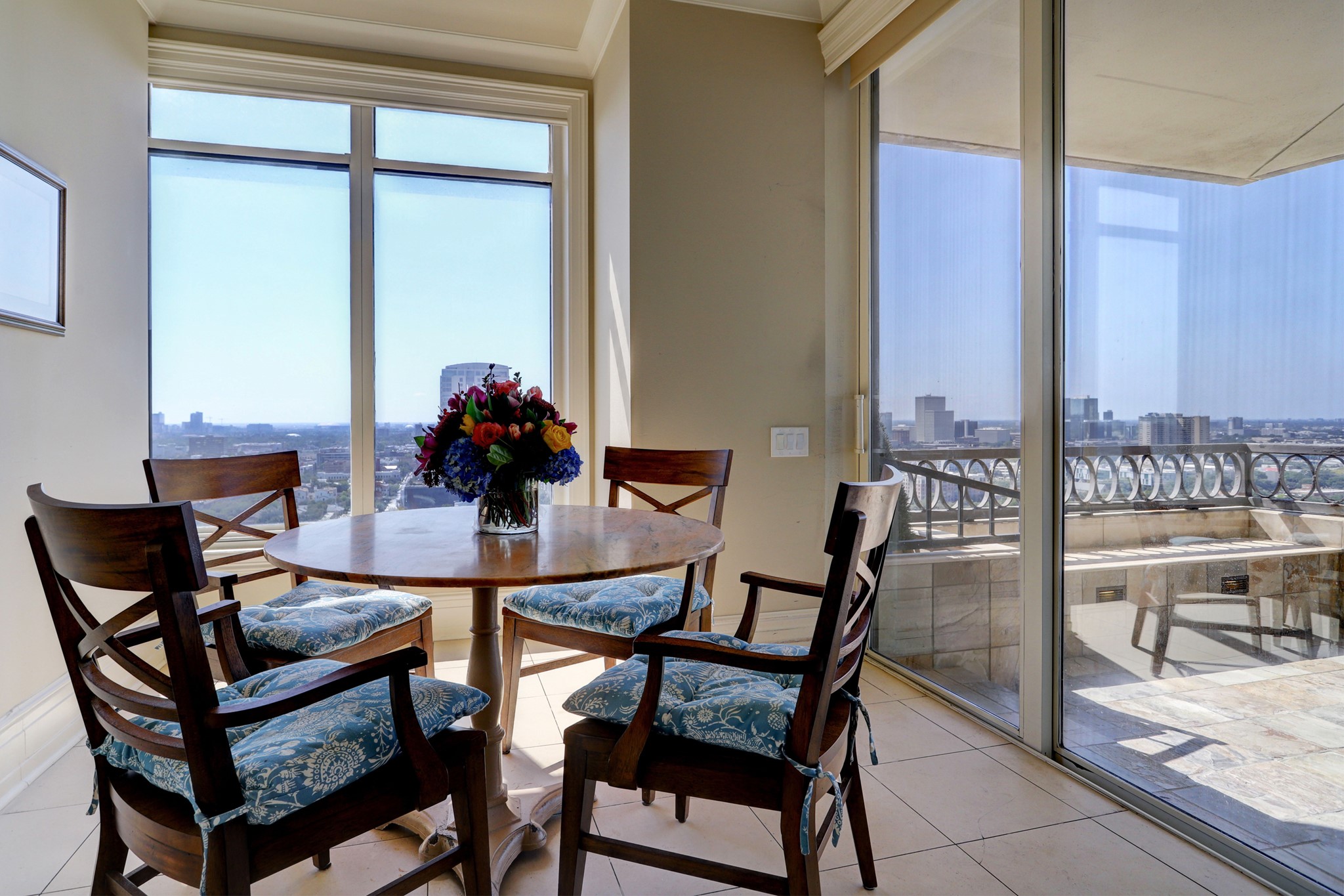 The breakfast room opens up to the balcony.