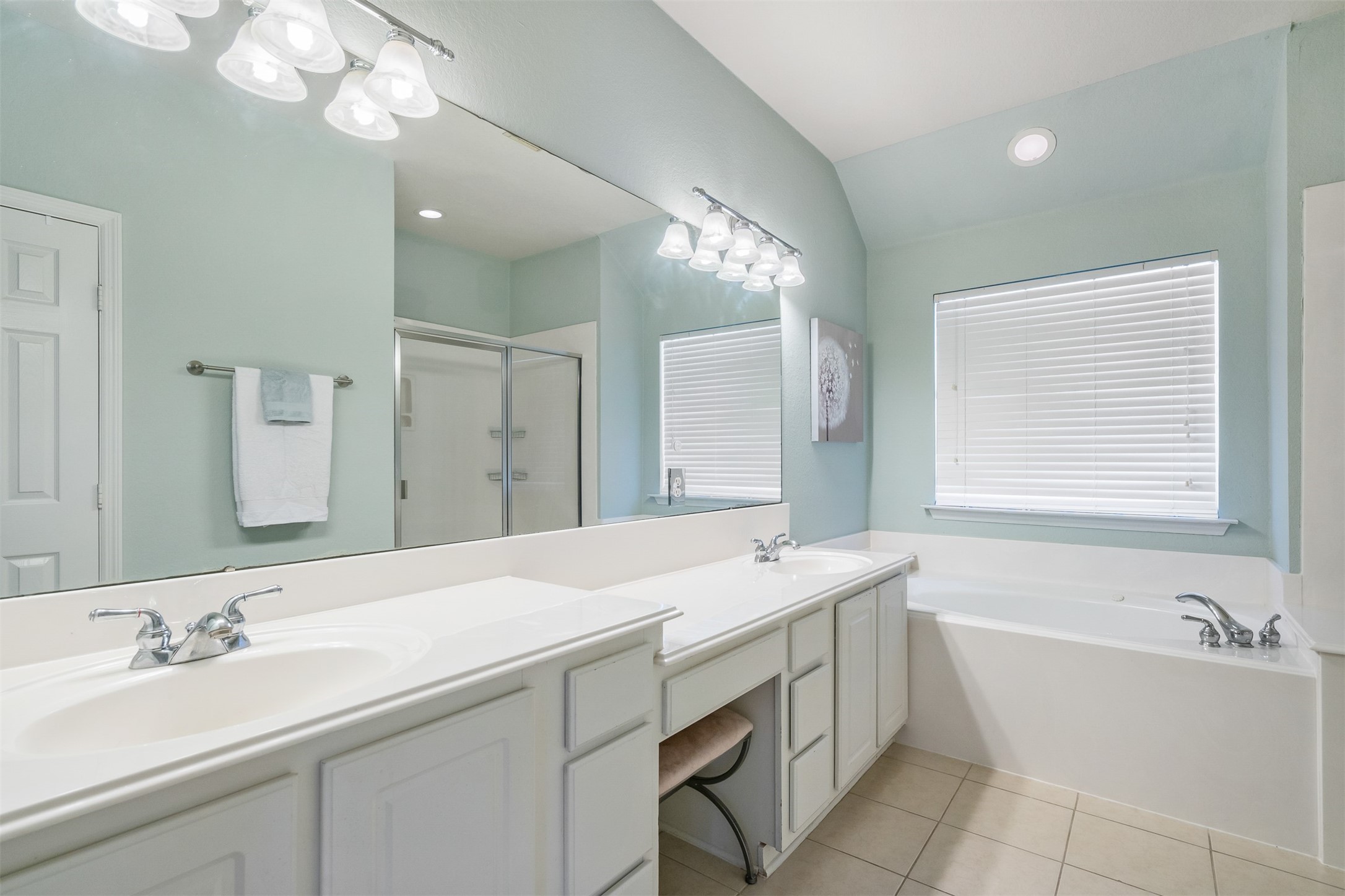 Master bath with double sinks, separate tub, separate shower and vanity area!