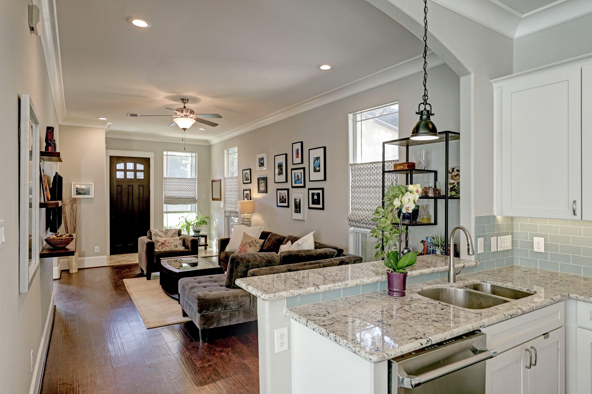 The setup is great for entertaining with the living and dining areas separated by the kitchen.