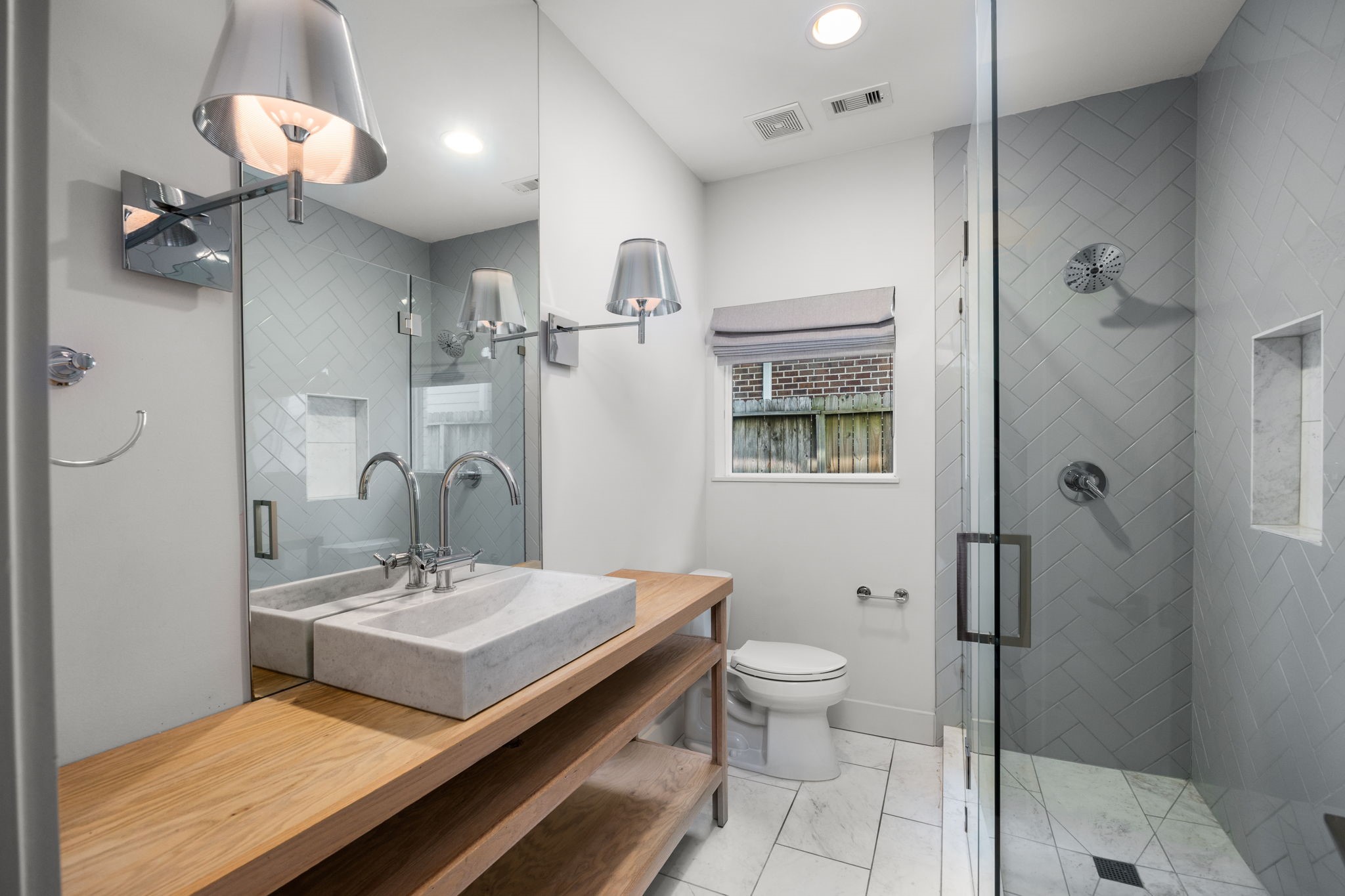 Full bathroom downstairs with gorgeous upgrades.