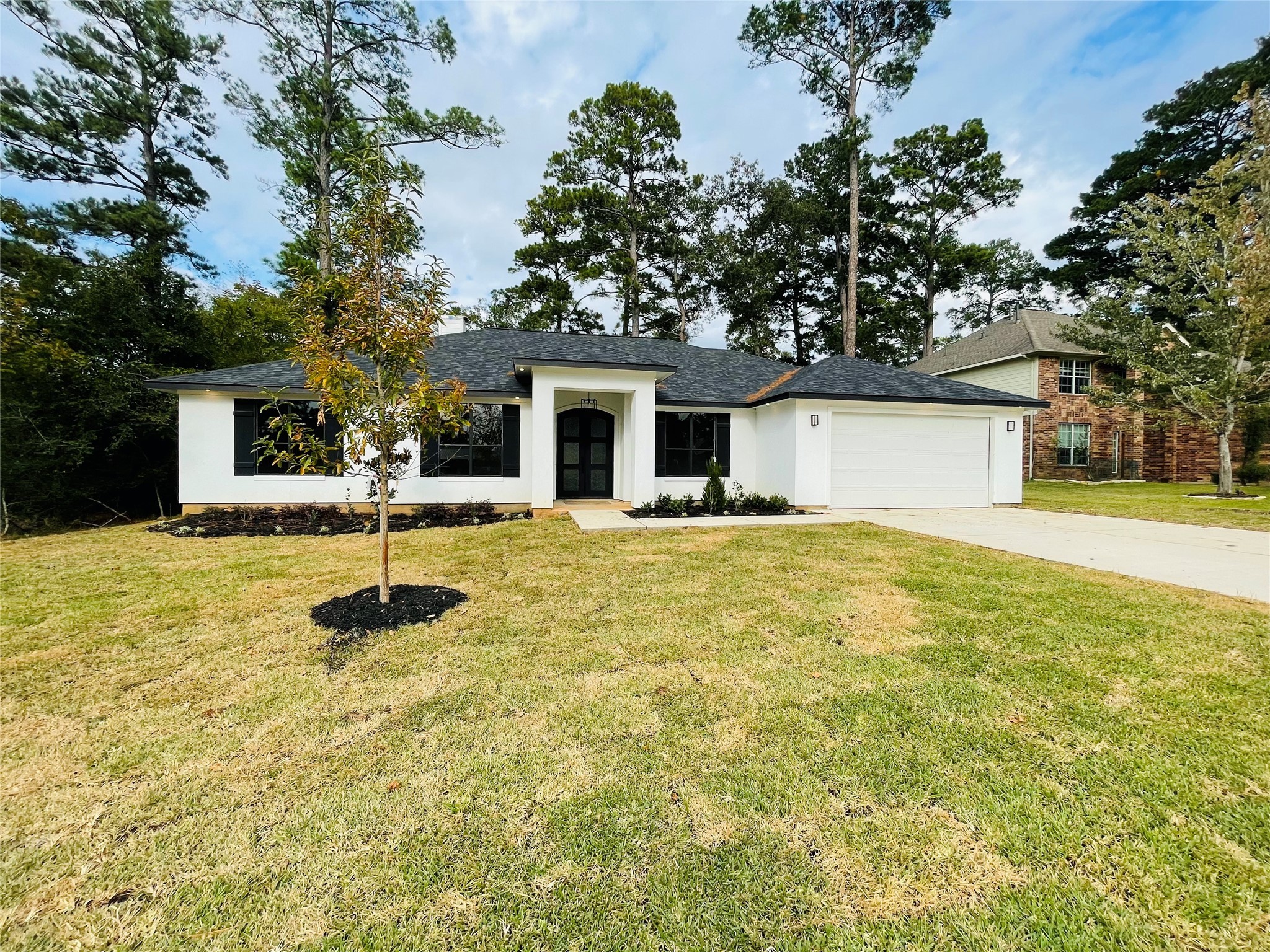 Welcome home to this 3 bedroom/3 bathroom/2 car garage home.  You won't want to miss this one with gorgeous appointments throughout.  For all that dislike carpet this home has NONE!!!  White stucco front/black window trim and shutters. Large lot!!