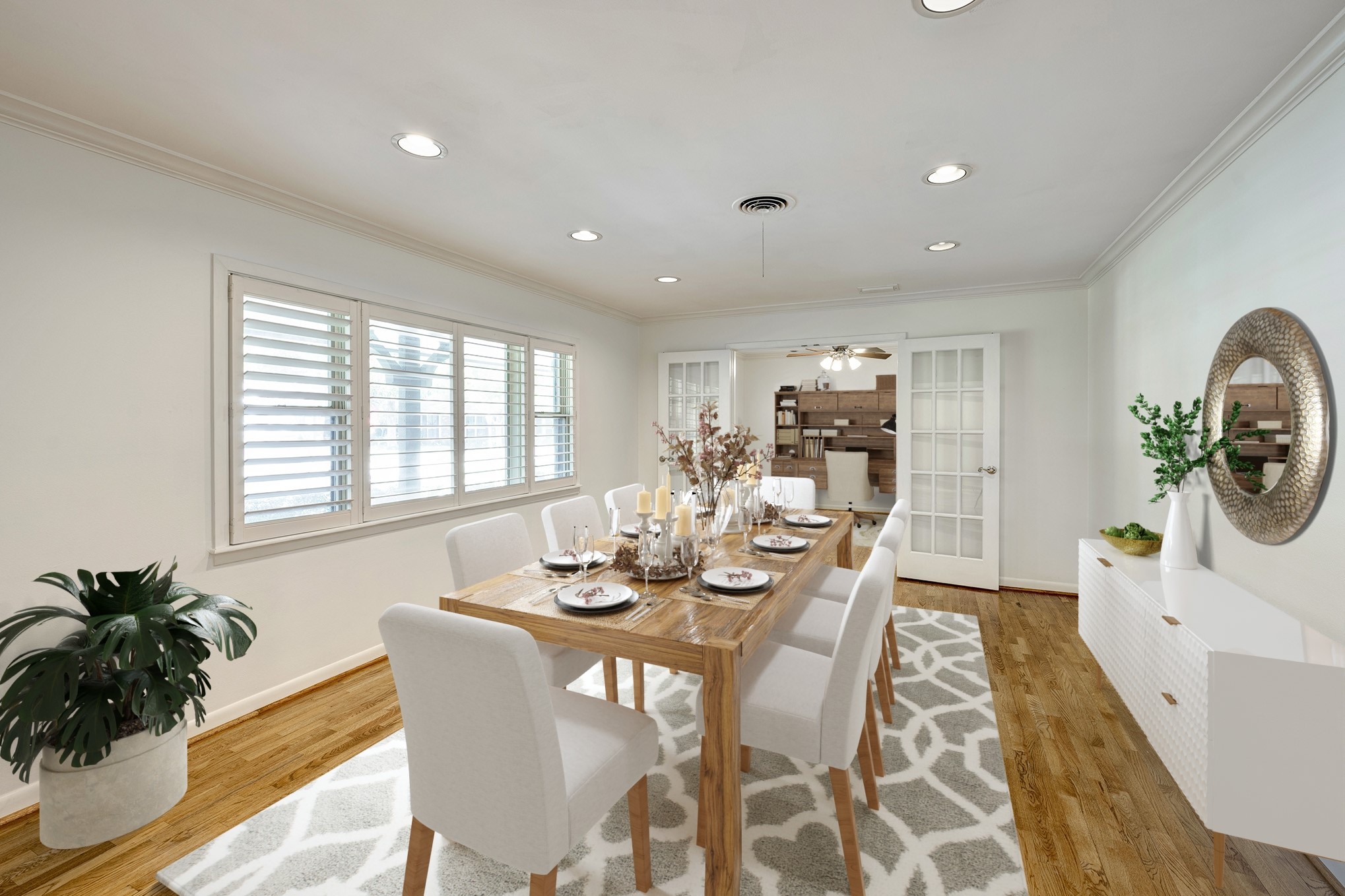 Formal Dining (virtually staged) with French doors to study/home office.