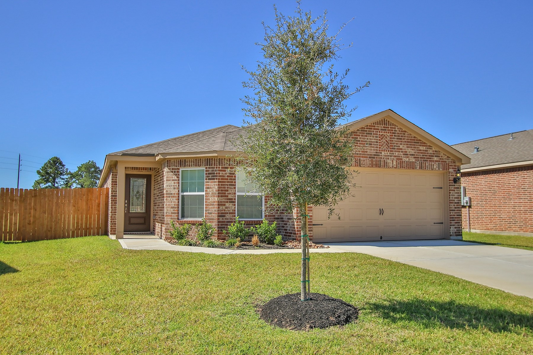 Beautiful 3/4 lite door and professional landscaping welcome you to this gorgeous home.