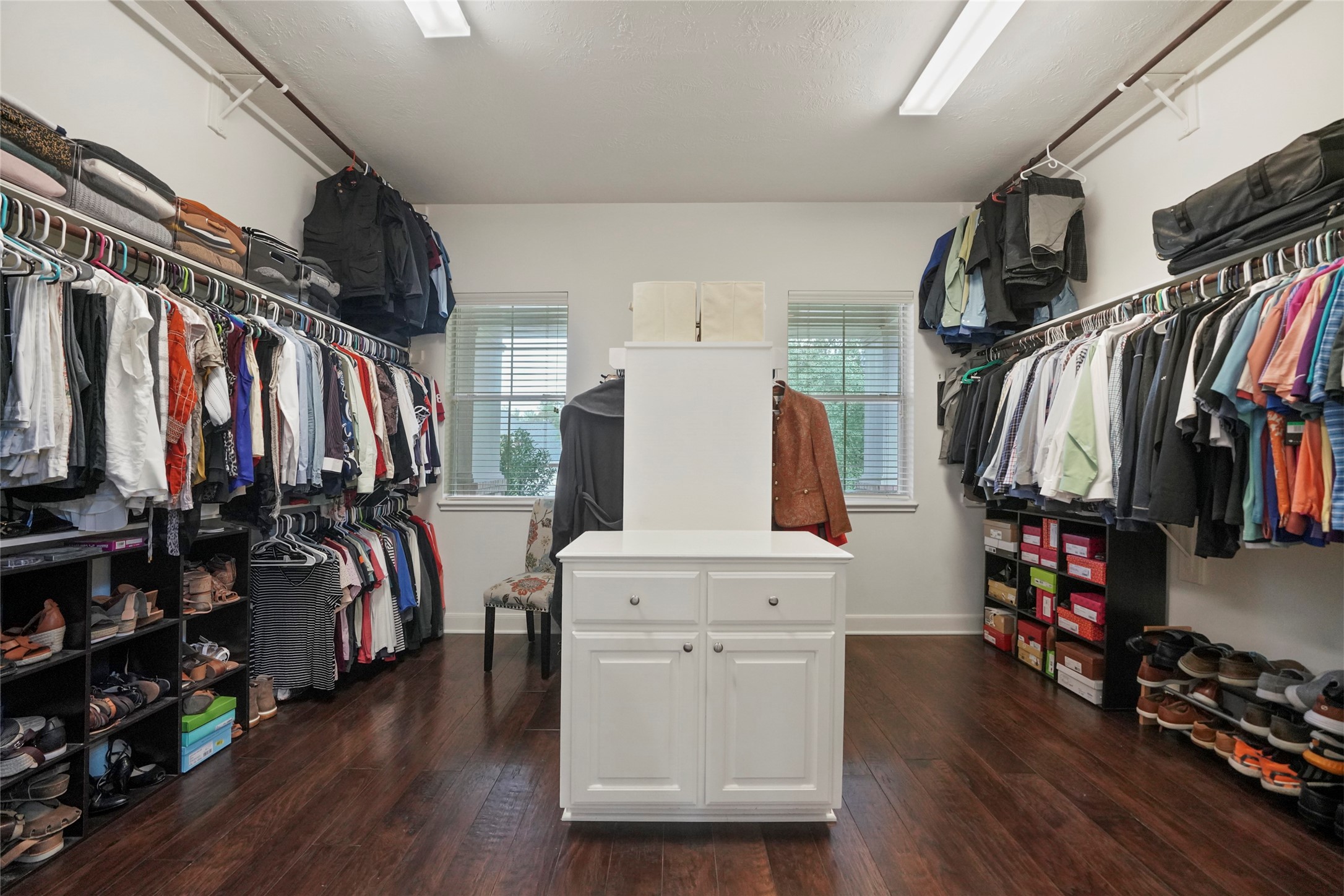 The storage offered in this home is amazing as showcased by the Primary walk-in closet.