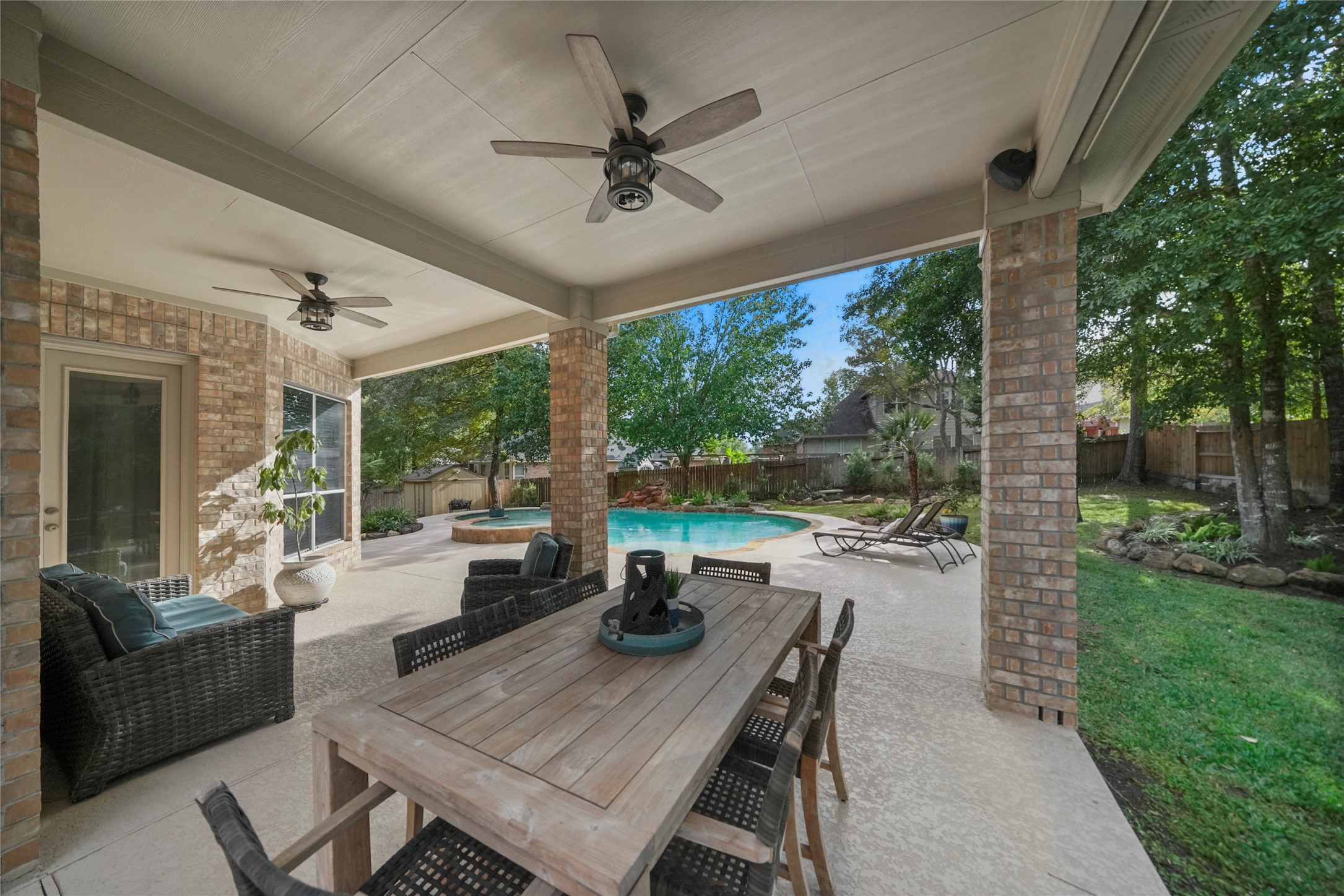 The covered patio is a comfortable space to relax or entertain.