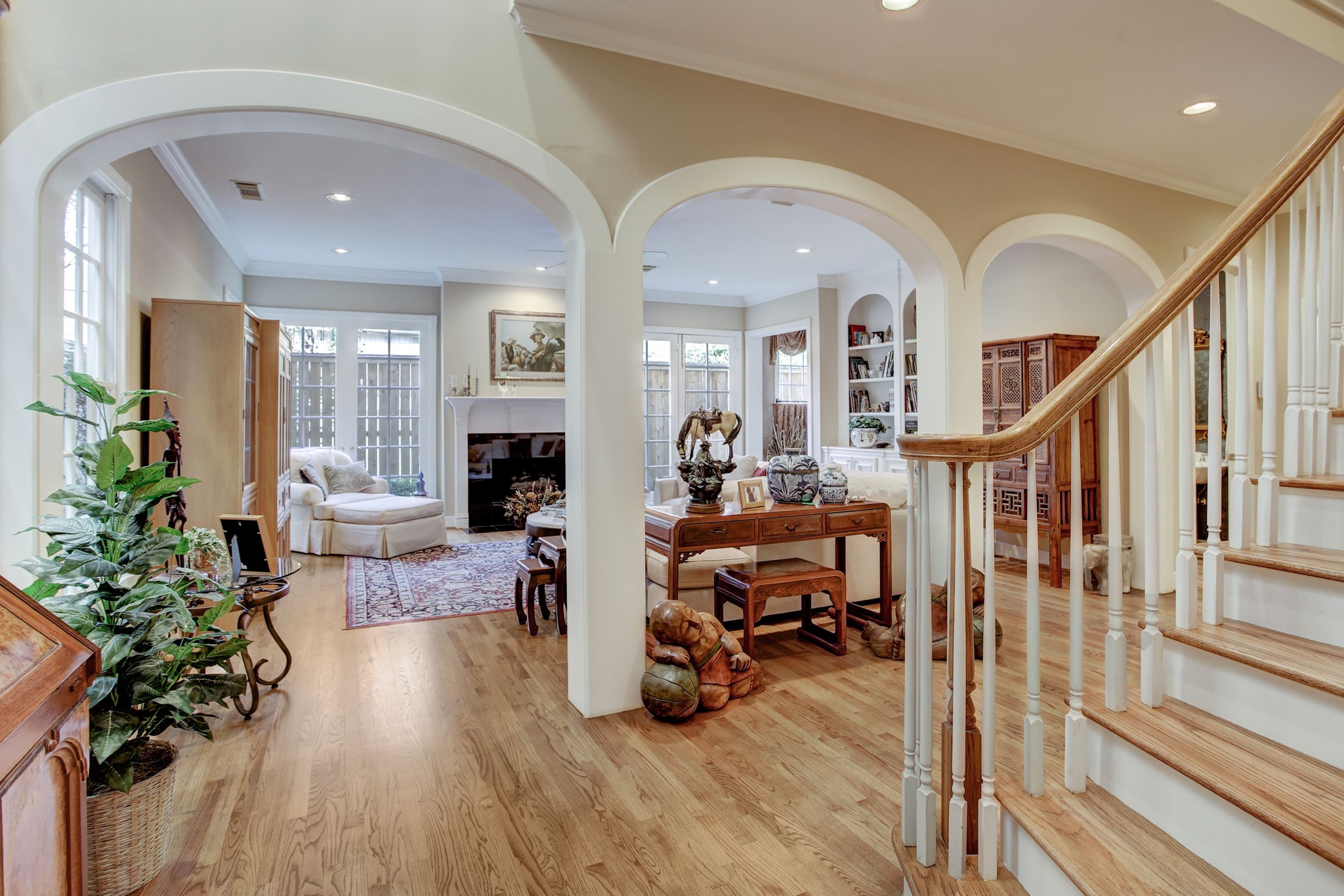 Sun-drenched family room with recent hardwood floors