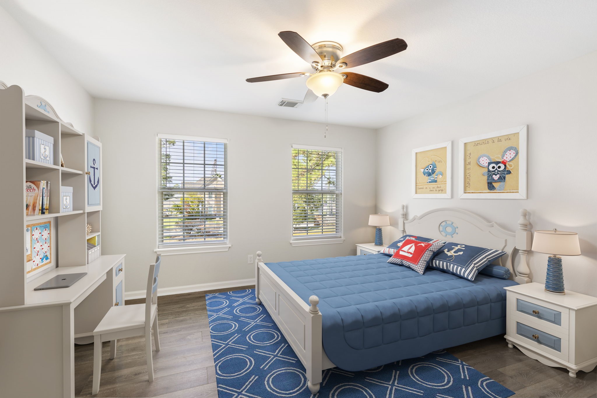 This secondary bedroom has two great windows, new flooring and walk in closet.   ** This image has been virtually staged