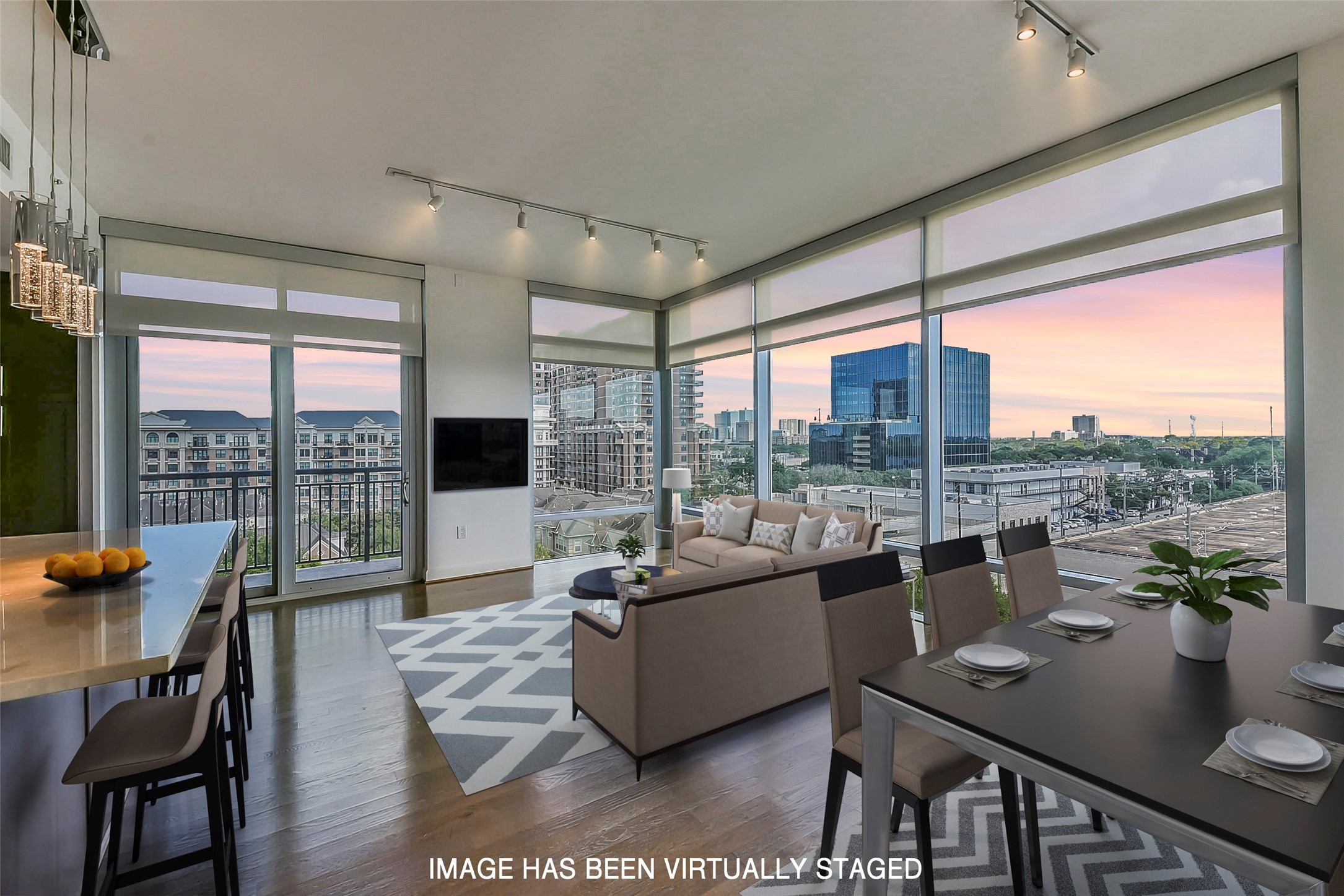 Welcome to elegance and luxury in Highland Tower in Unit 705. Gorgeous dusk views from your floor to ceiling windows.