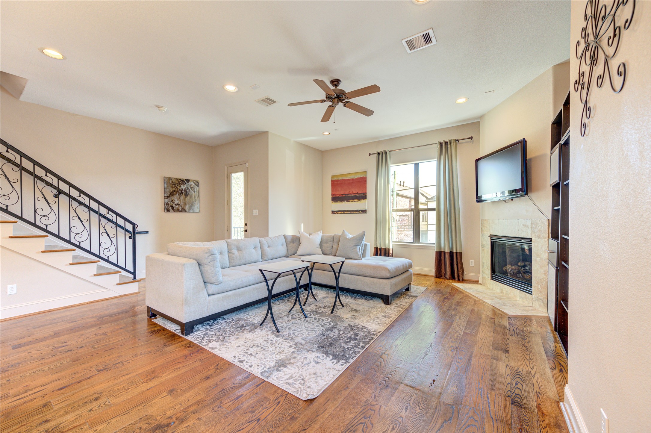 Welcome home to your 3 bedroom/3.5 bath home, with open spaces with plenty of natural light, hardwood floors, and a cozy fireplace.