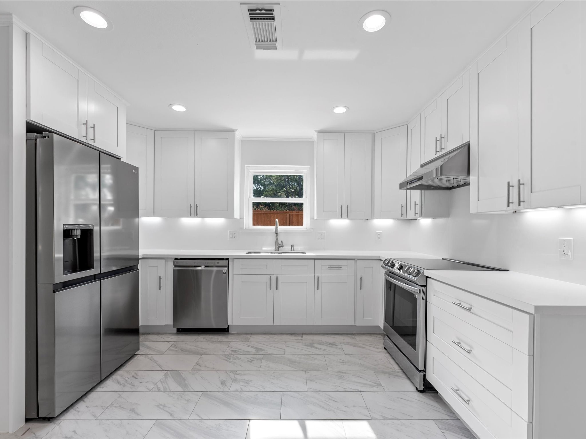 Interior features and finishes include all brand new tile floors, quartz countertops, stainless steel appliances and fresh paint all throughout.